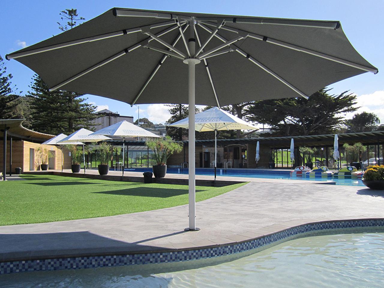 backyard creations waterford collection patio umbrella Frankford Umbrellas Nova Giant Center 16 Foot Octagon Aluminum Telescoping  Crank Umbrella