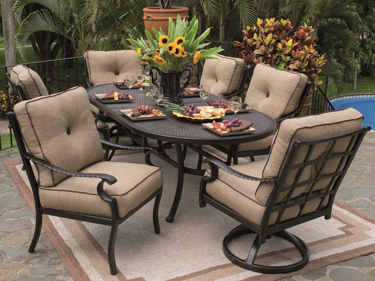 84 ornate glass top patio table with umbrella Castelle Vintage 84-Inch Oval Dining Table with Umbrella Hole
