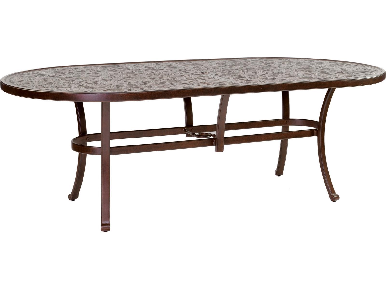 84 ornate glass top patio table with umbrella Castelle Vintage 84-Inch Oval Dining Table with Umbrella Hole