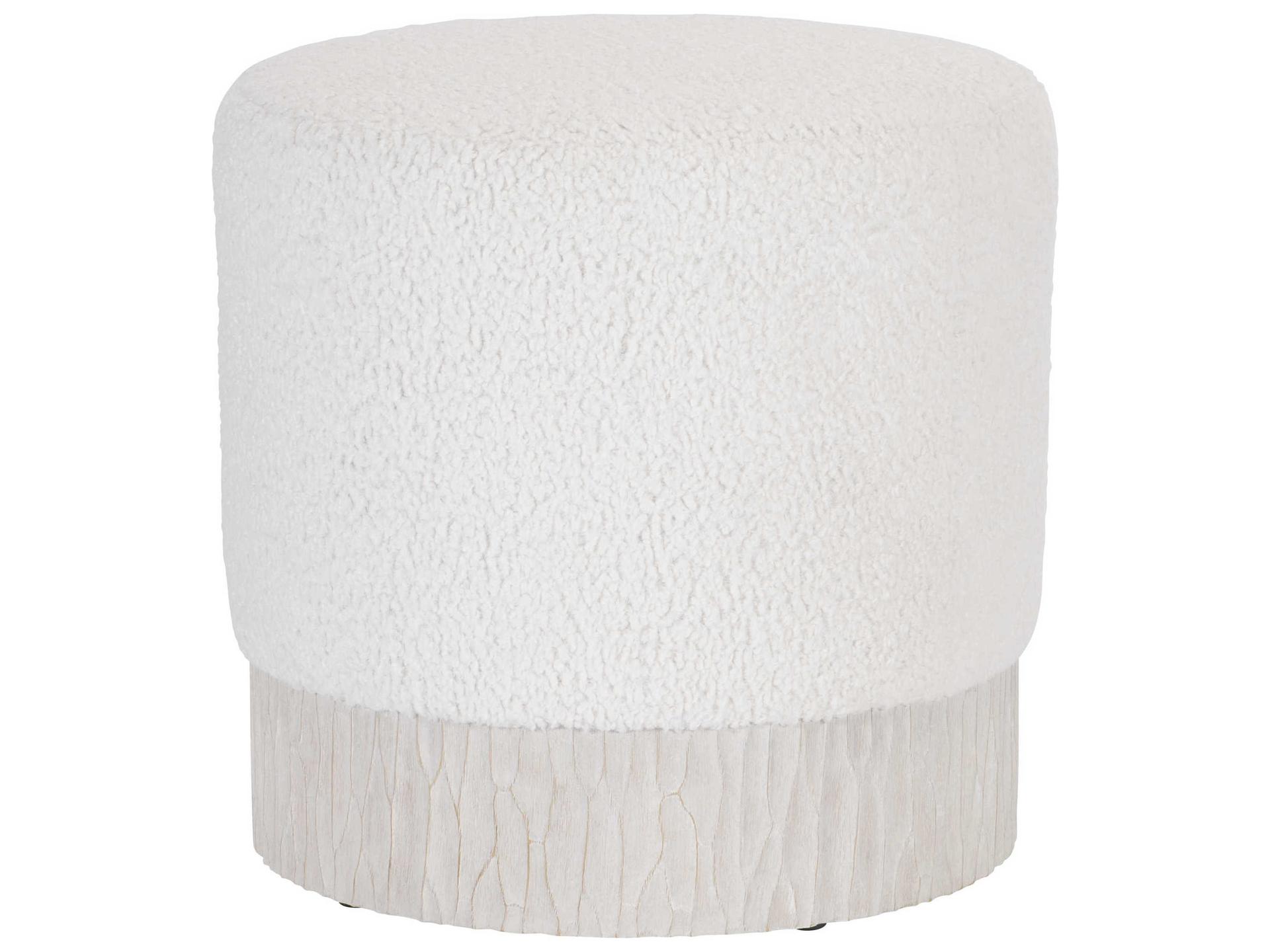 Solaria Upholstered Round Ottoman with Chiseled Resin Base