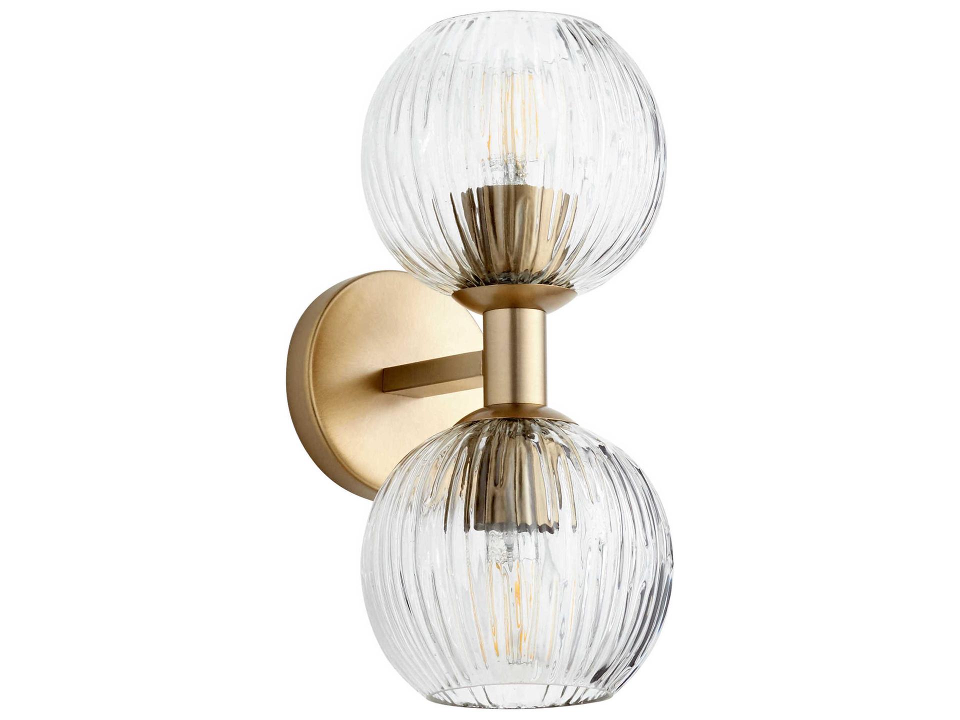 Helios 2-Light Wall Sconce in Aged Brass and Clear Glass