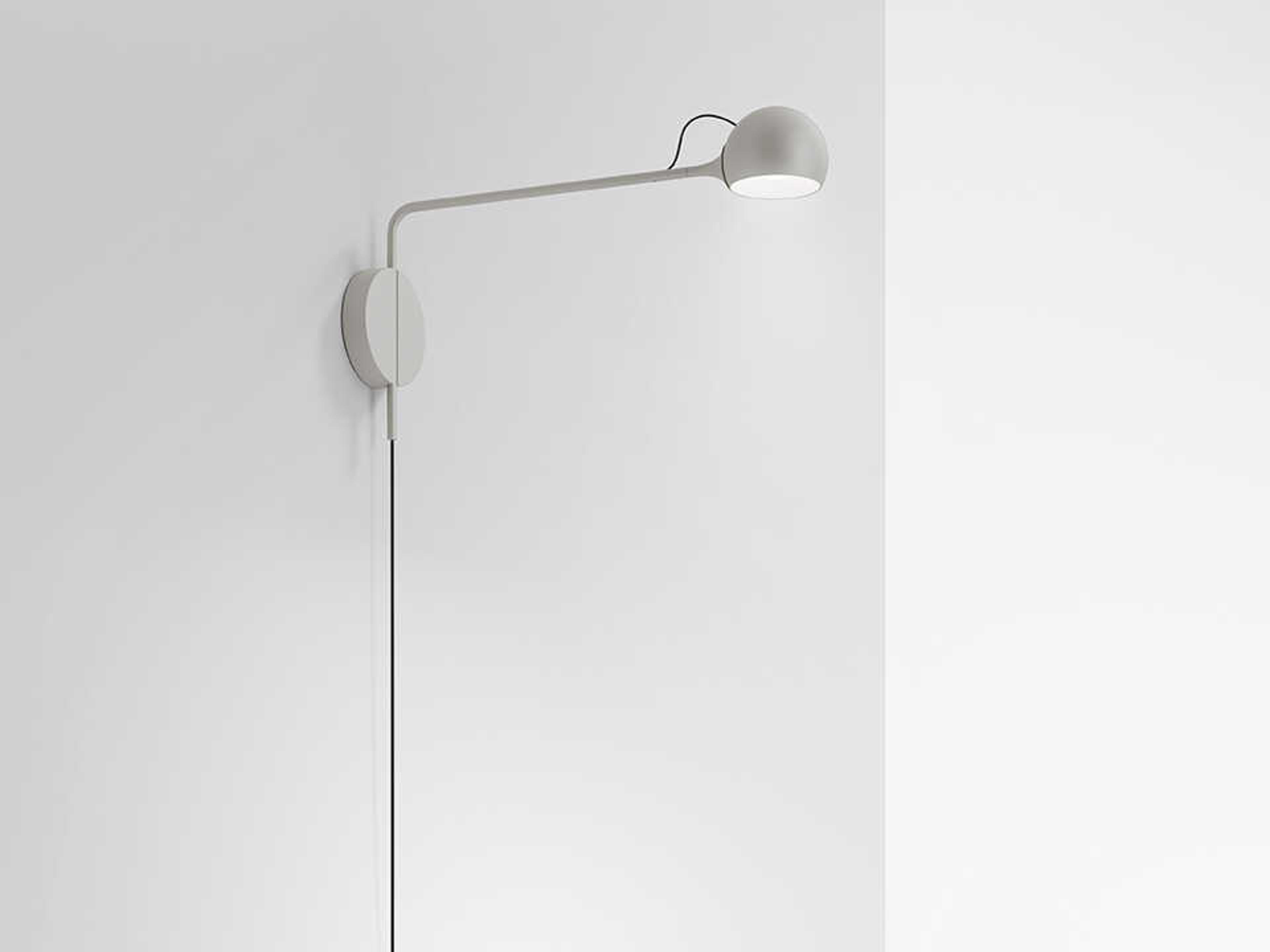 Artemide Ixa White Swing Wall Sconce