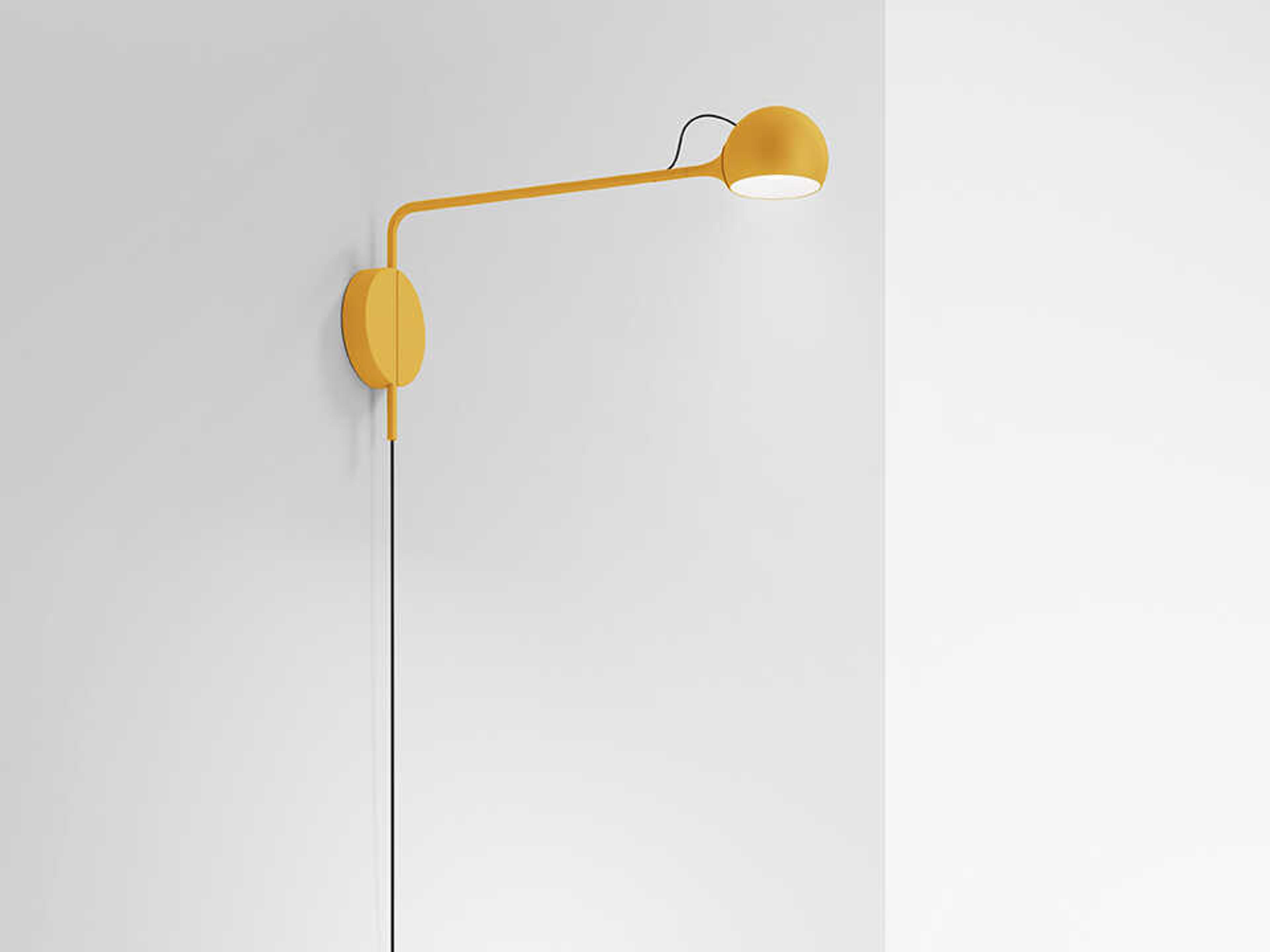 Artemide Ixa Yellow Swing Wall Sconce