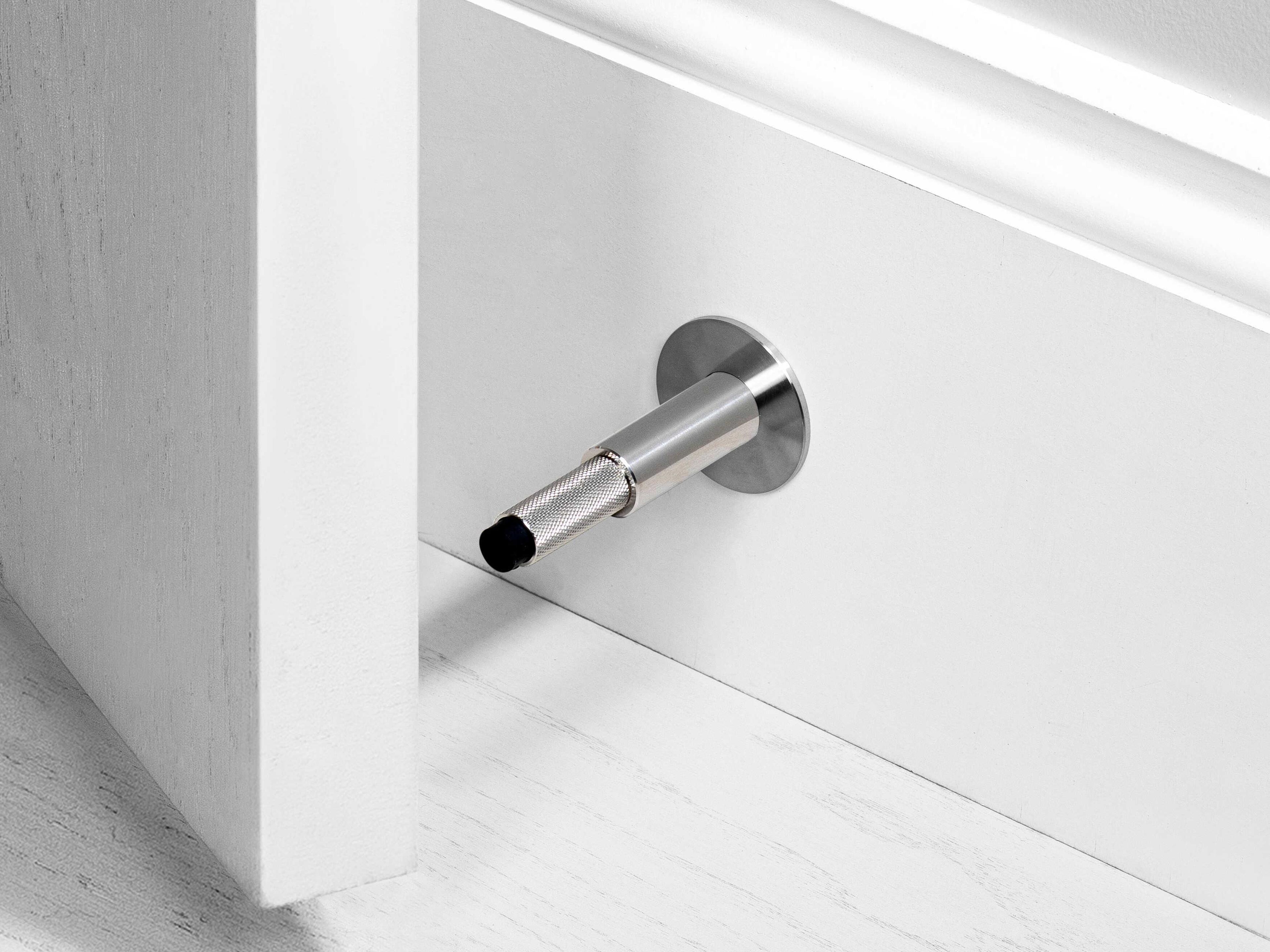 Buster + Punch Steel Wall Door Stop