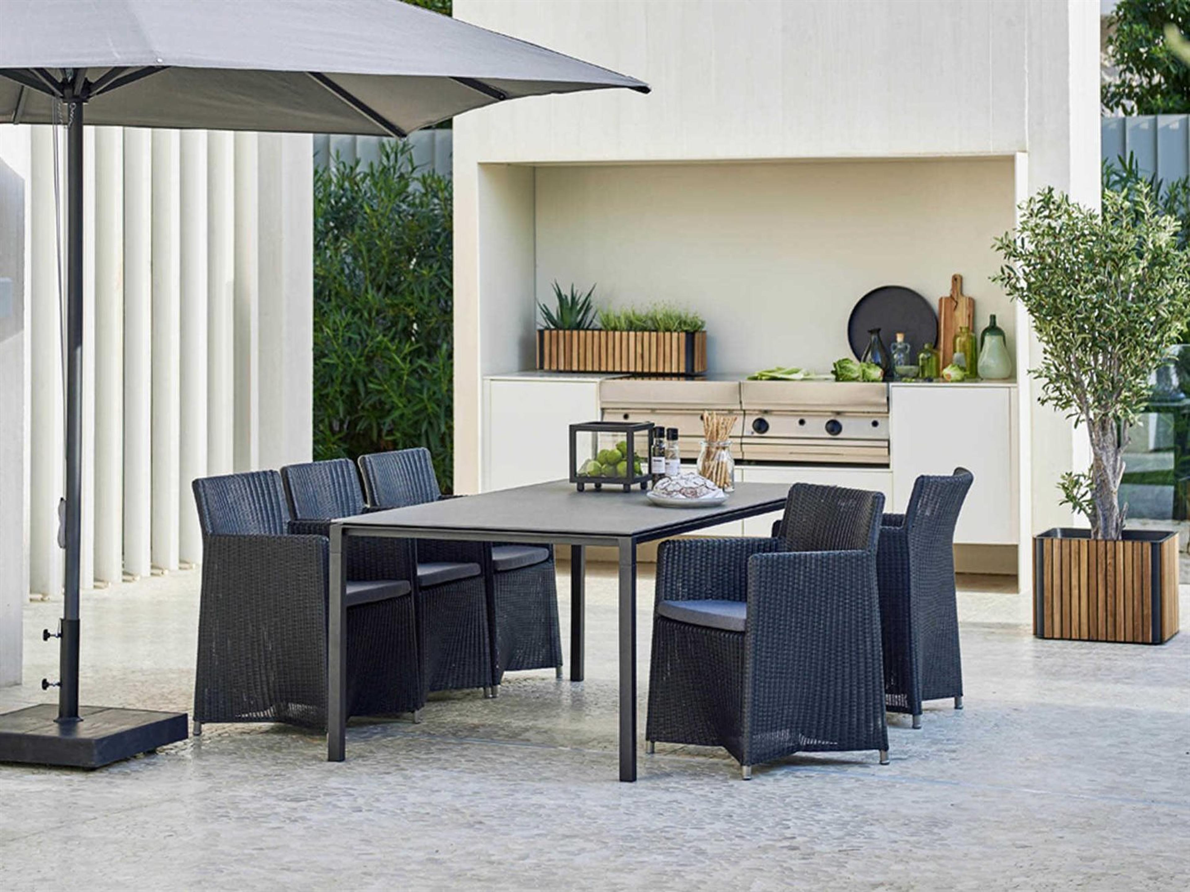 Cane Line Outdoor Diamond Graphite Wicker Aluminum Dining Arm Chair in Grey