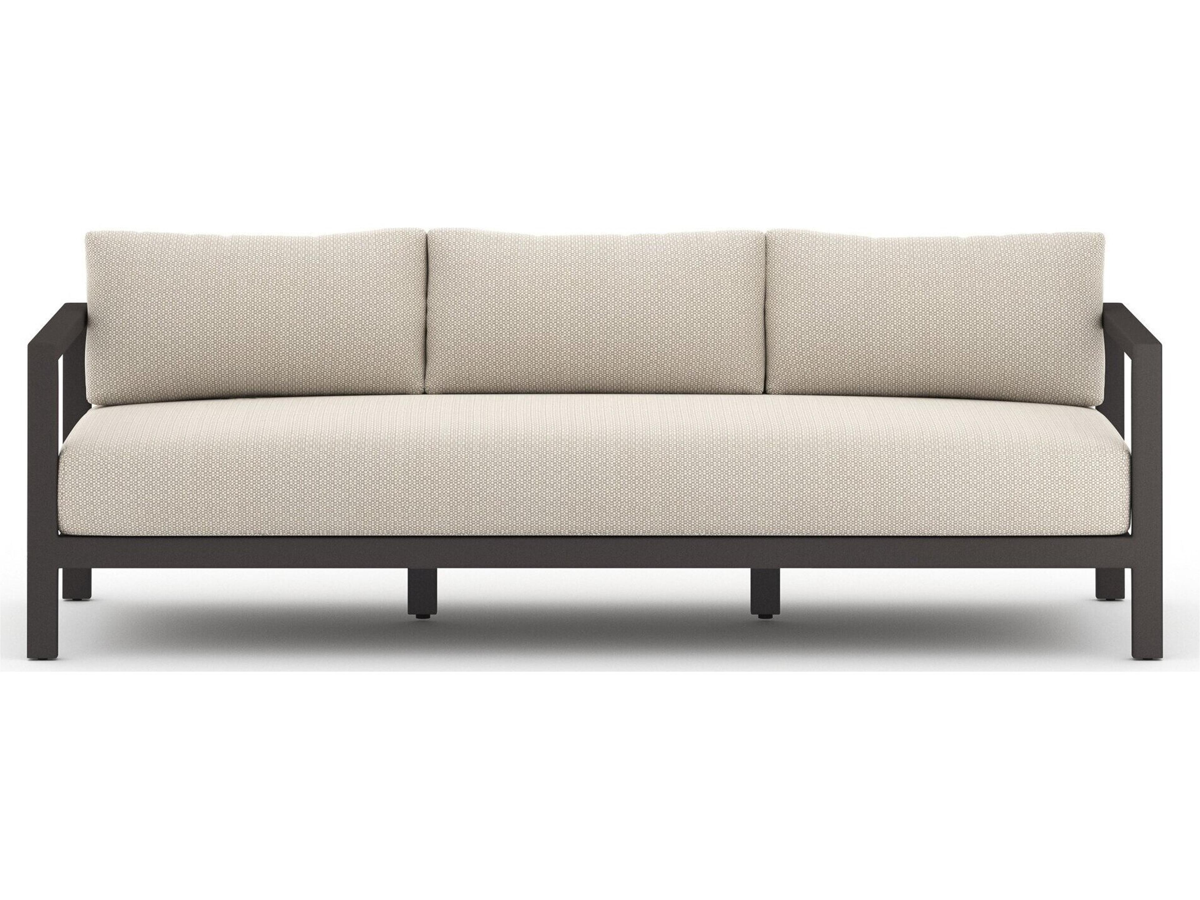 Four Hands Outdoor Solano Bronze / Ivory Strap Sofa with Faye Sand Cushion