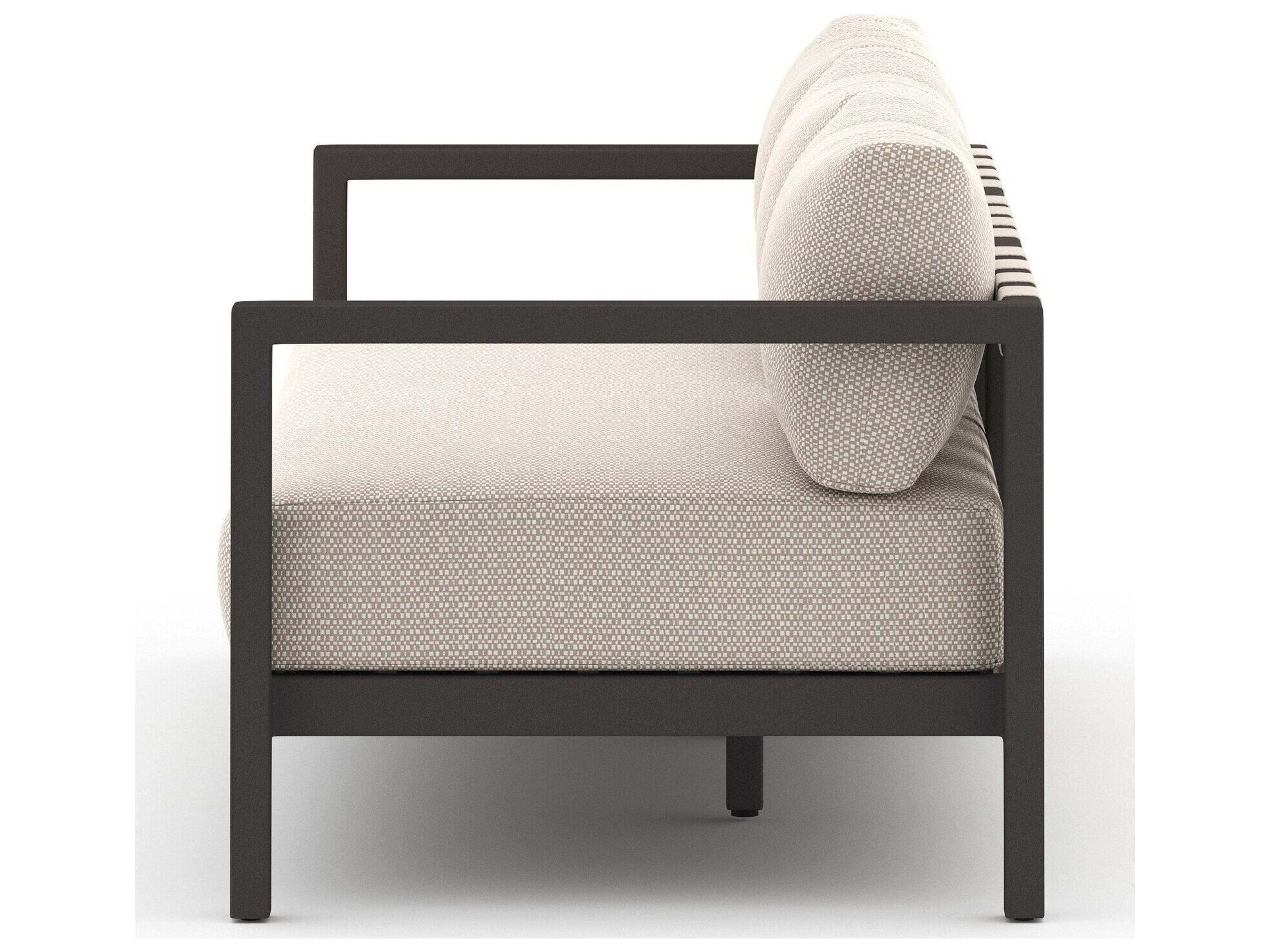 Four Hands Outdoor Solano Bronze / Ivory Strap Sofa with Faye Sand Cushion