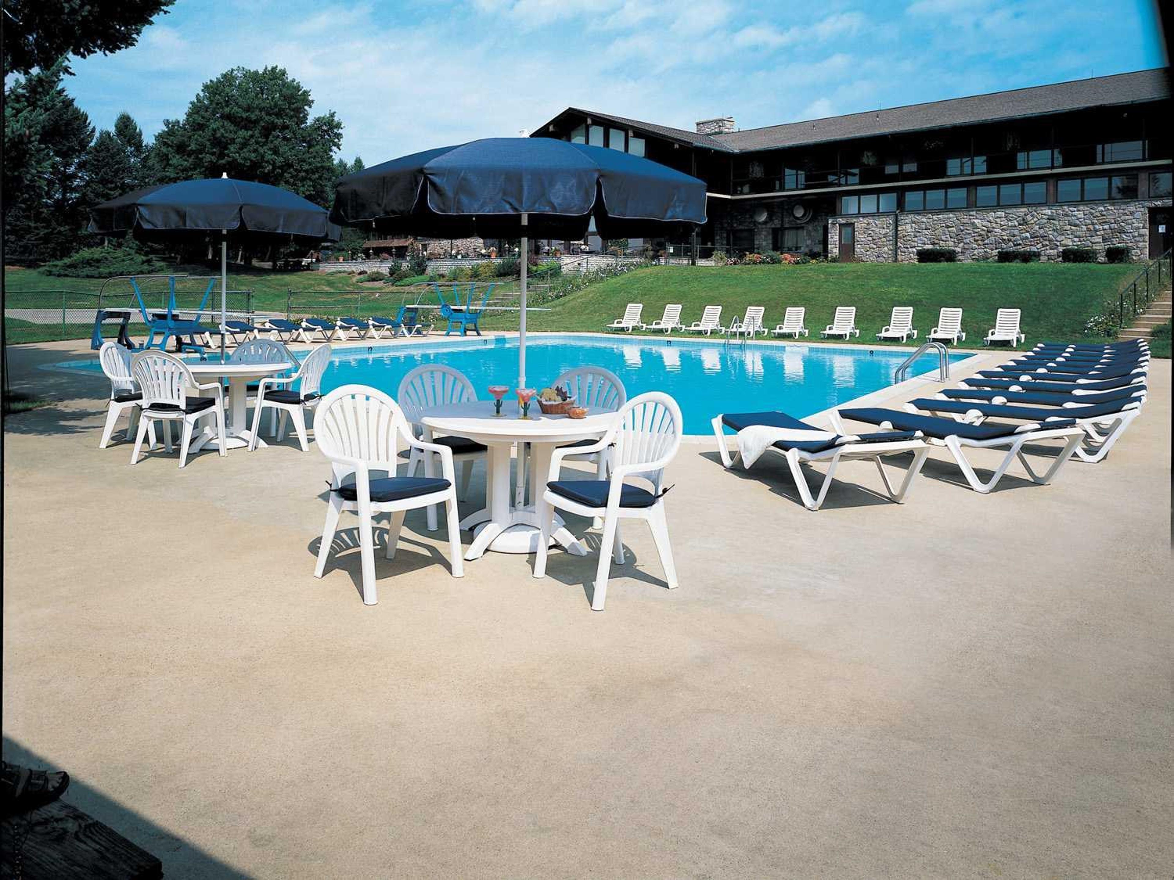 Pacific Fanback Resin White Patio Dining Set