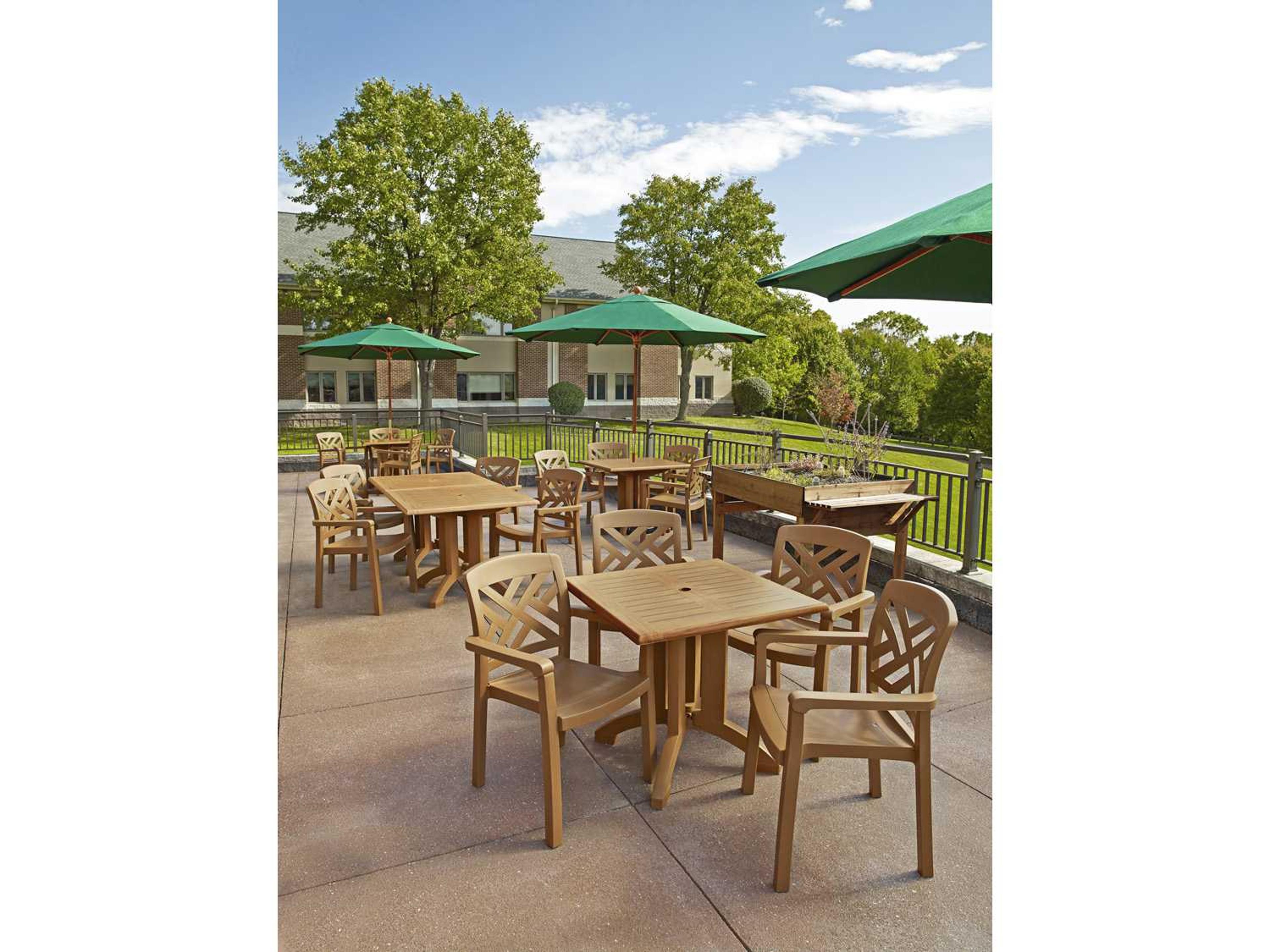 Grosfillex Sanibel Resin Teakwood Stacking Patio Dining Arm Chair