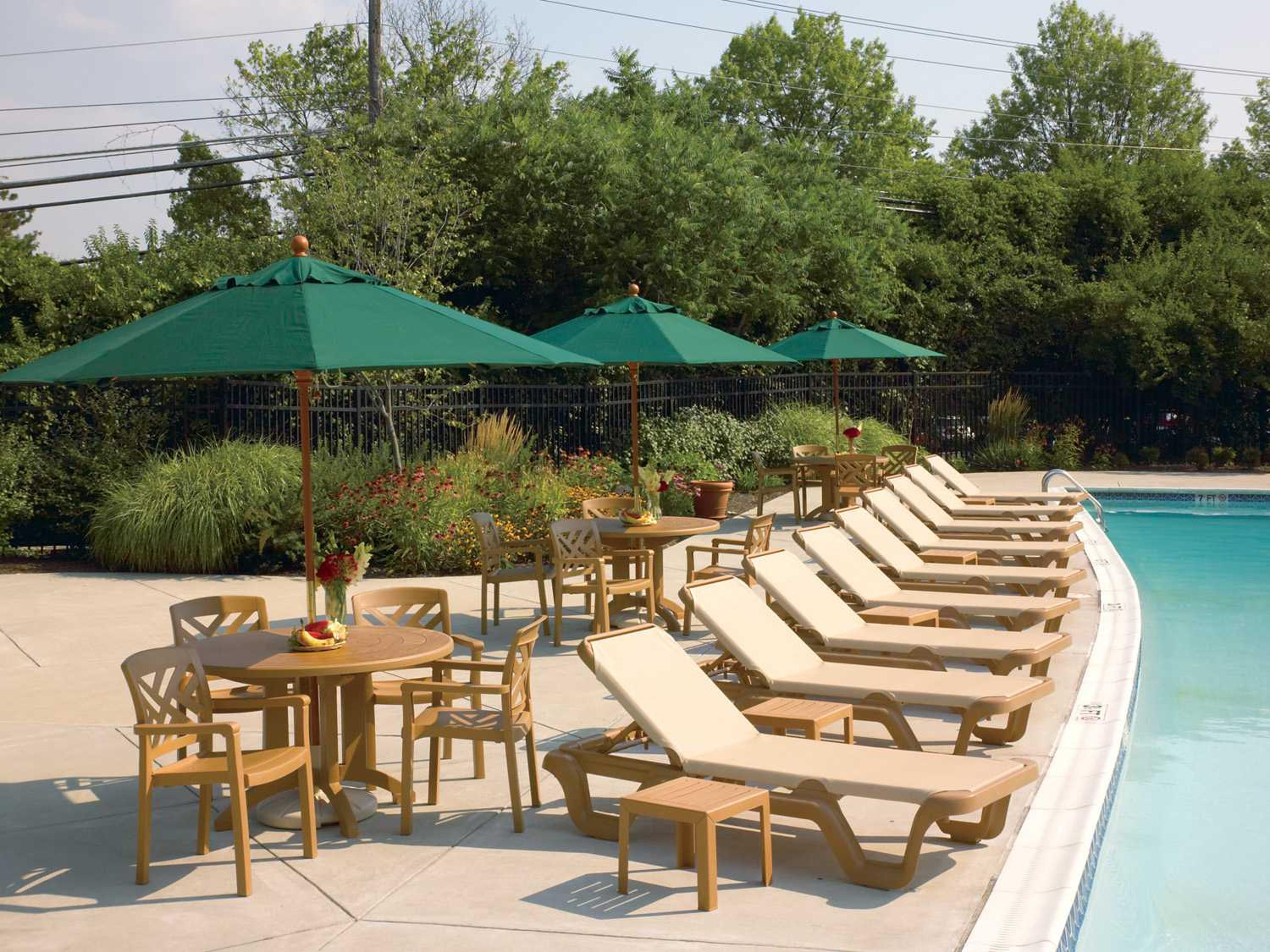 Grosfillex Sanibel Resin Teakwood Stacking Patio Dining Arm Chair