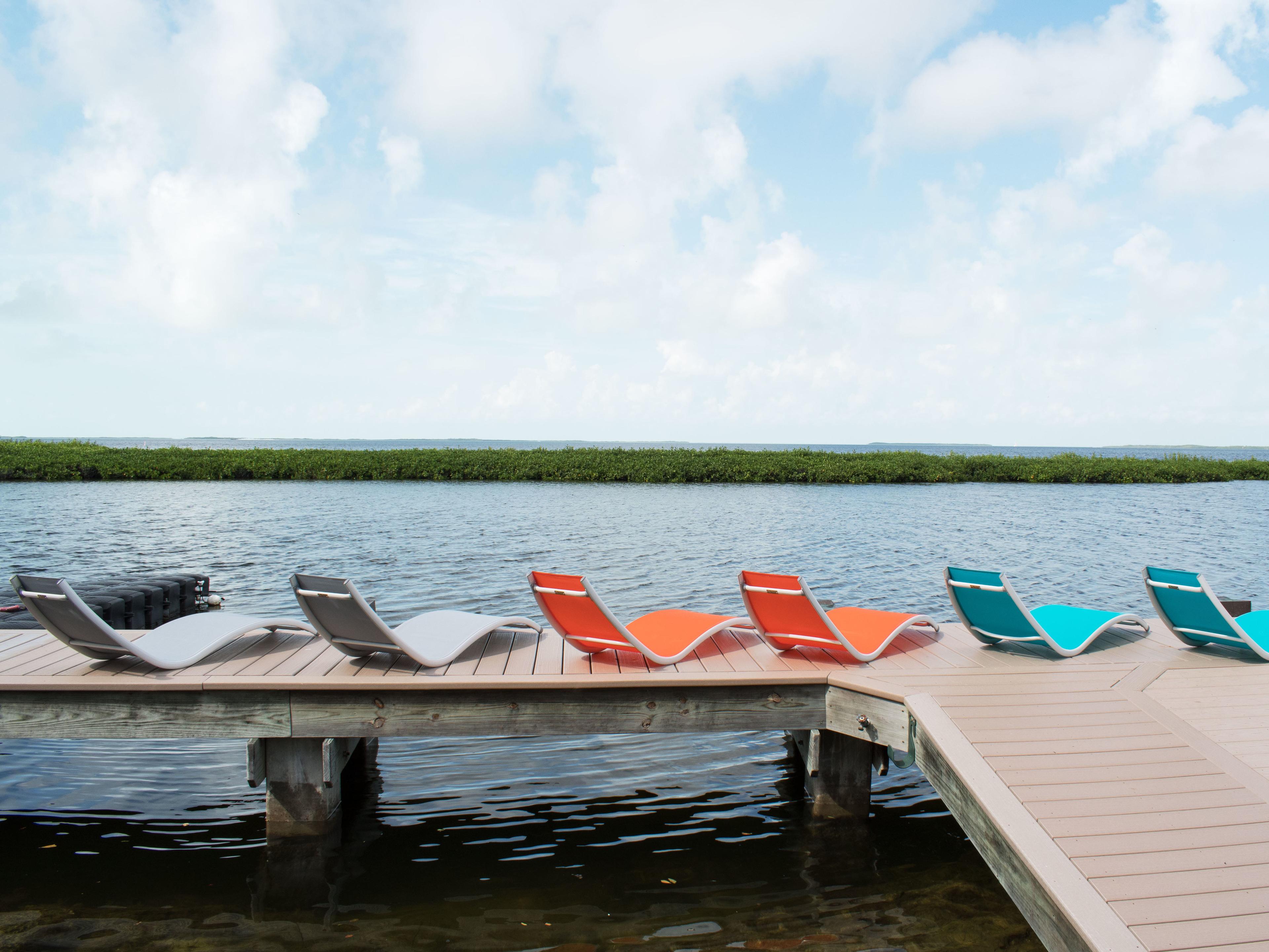 Hospitality Rattan Outdoor Helix Aluminum Sling White/Orange Chaise Lounge Set of 2