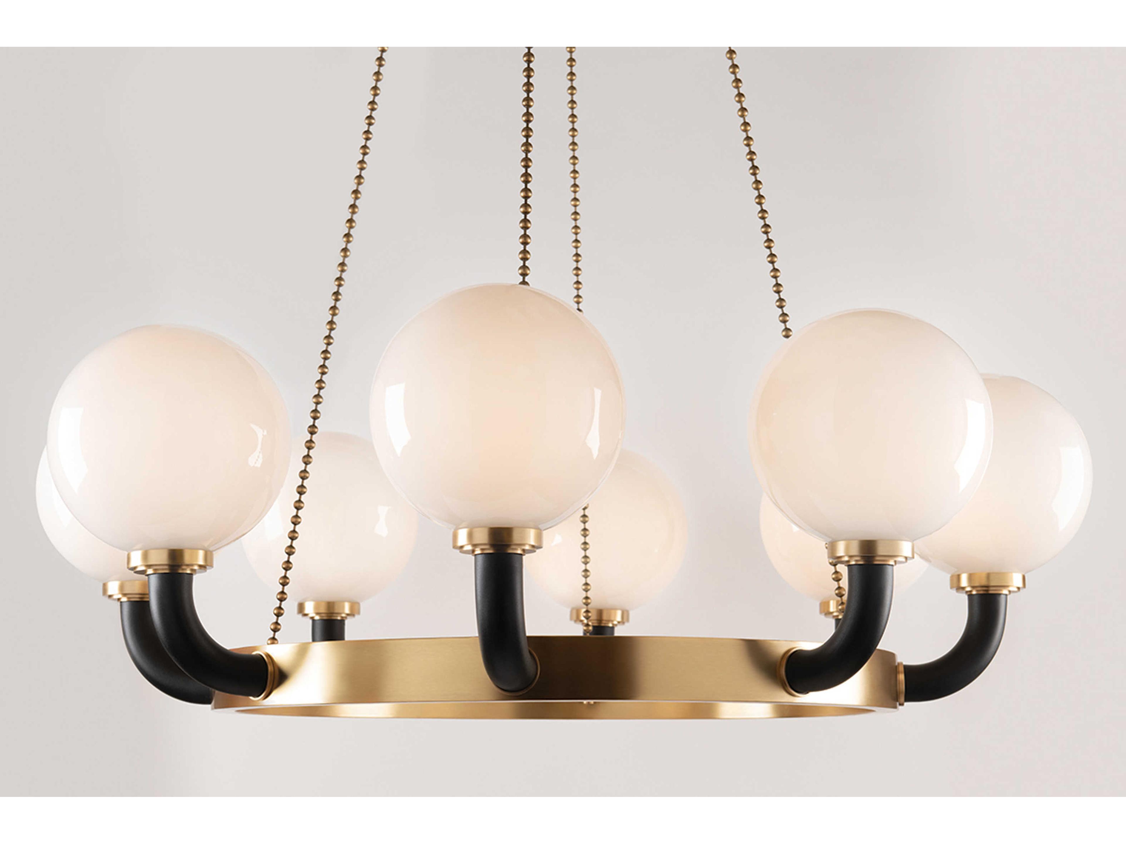 Hudson Valley Werner 8-Light Aged Brass Black Glass Globe Chandelier