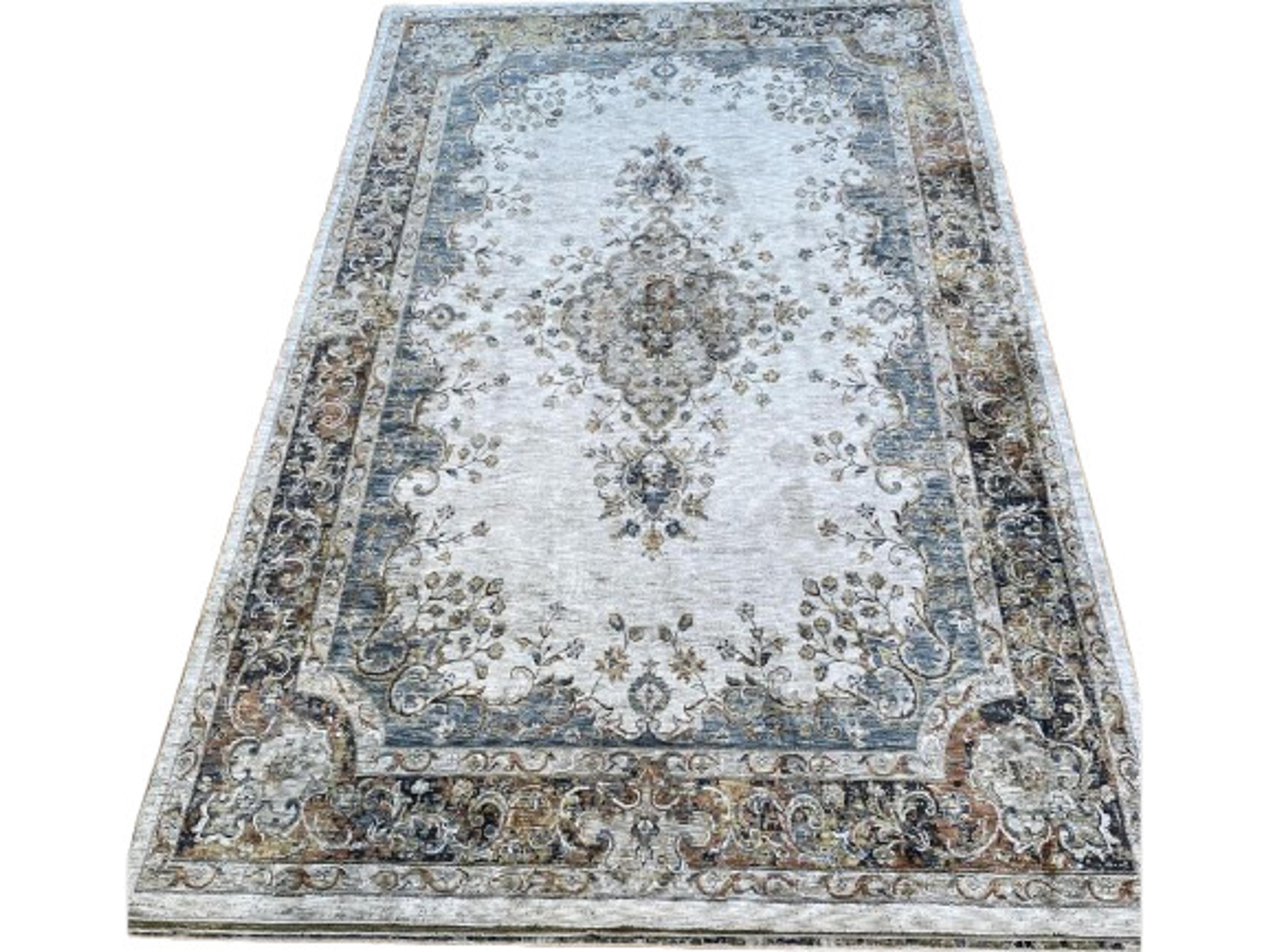 Avani Bordered Area Rug