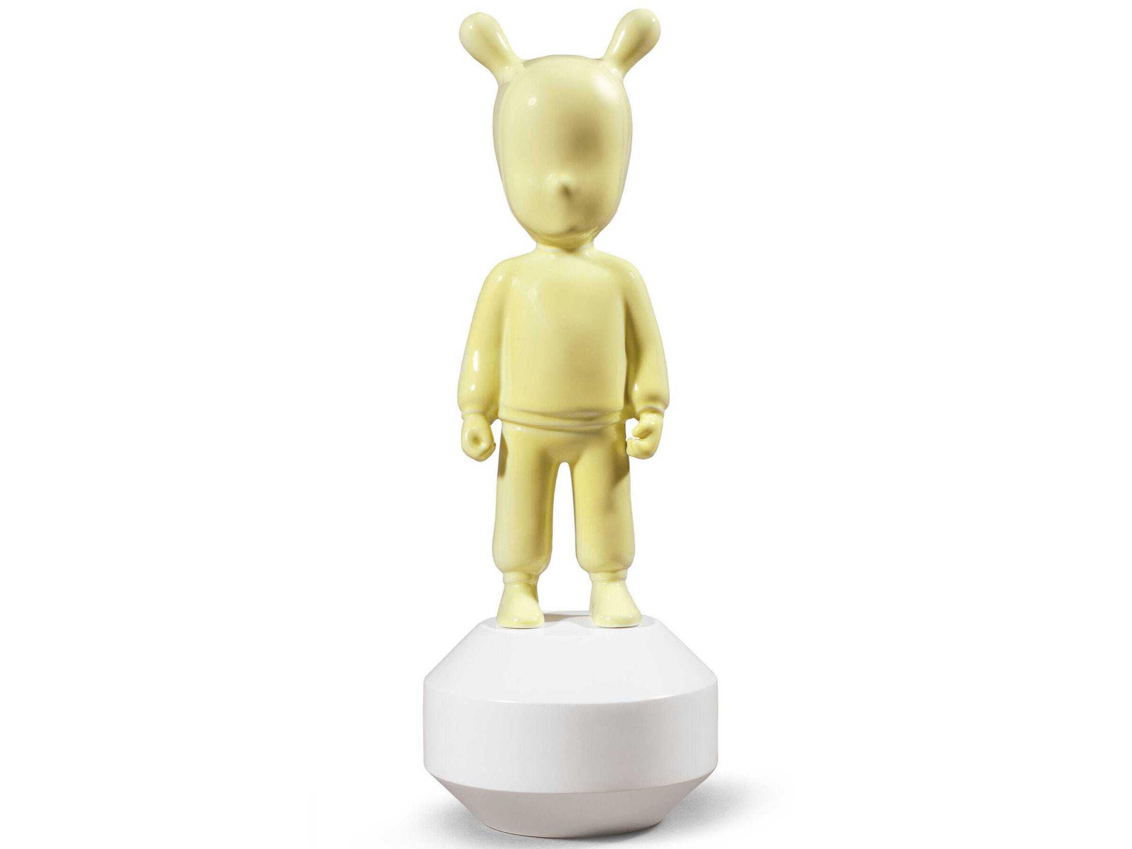 The Yellow Guest Figurine