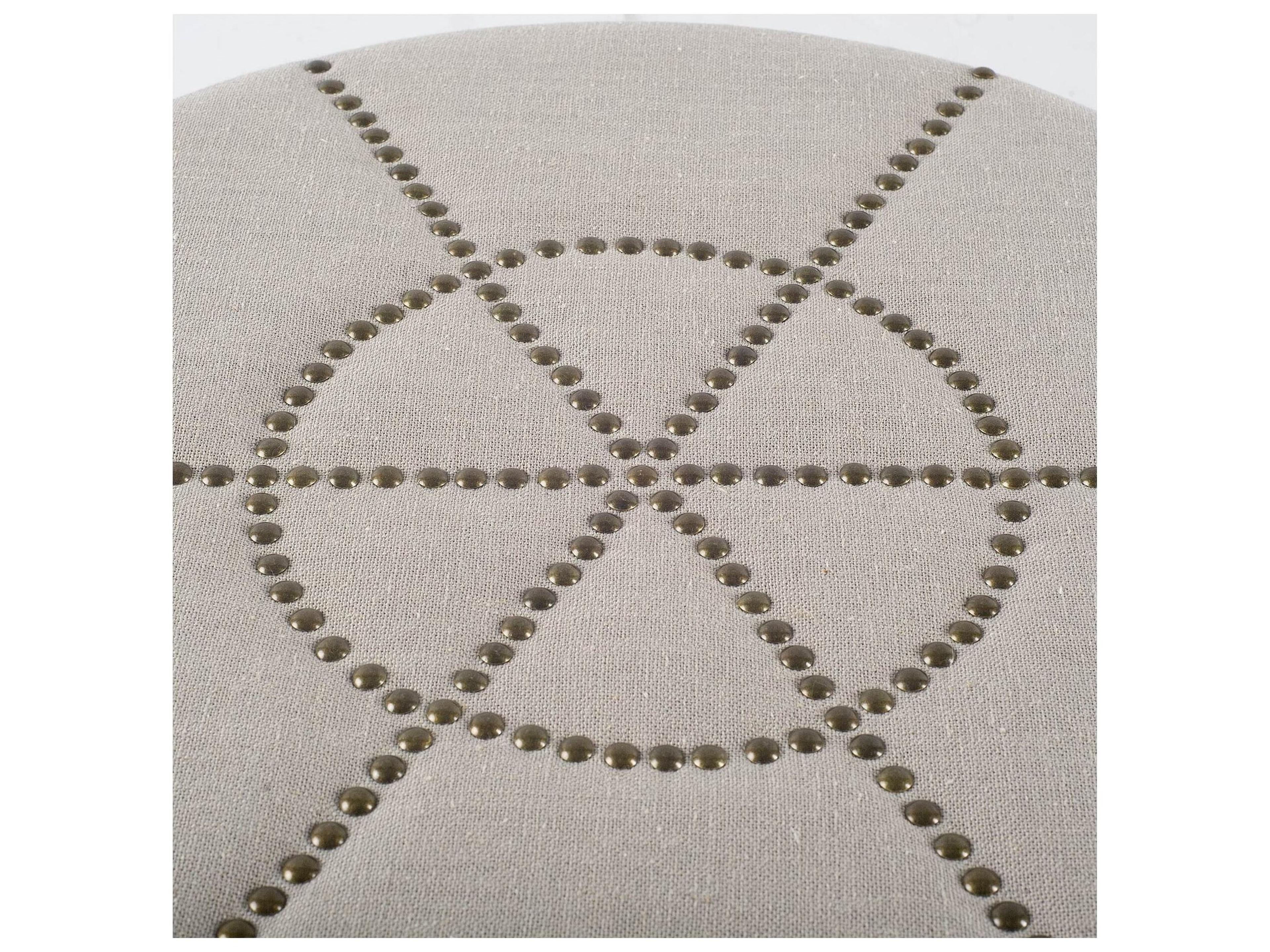 Mercana Beacon 20.5"H Cream Fabric w/ Metal Tacks Round Ottoman