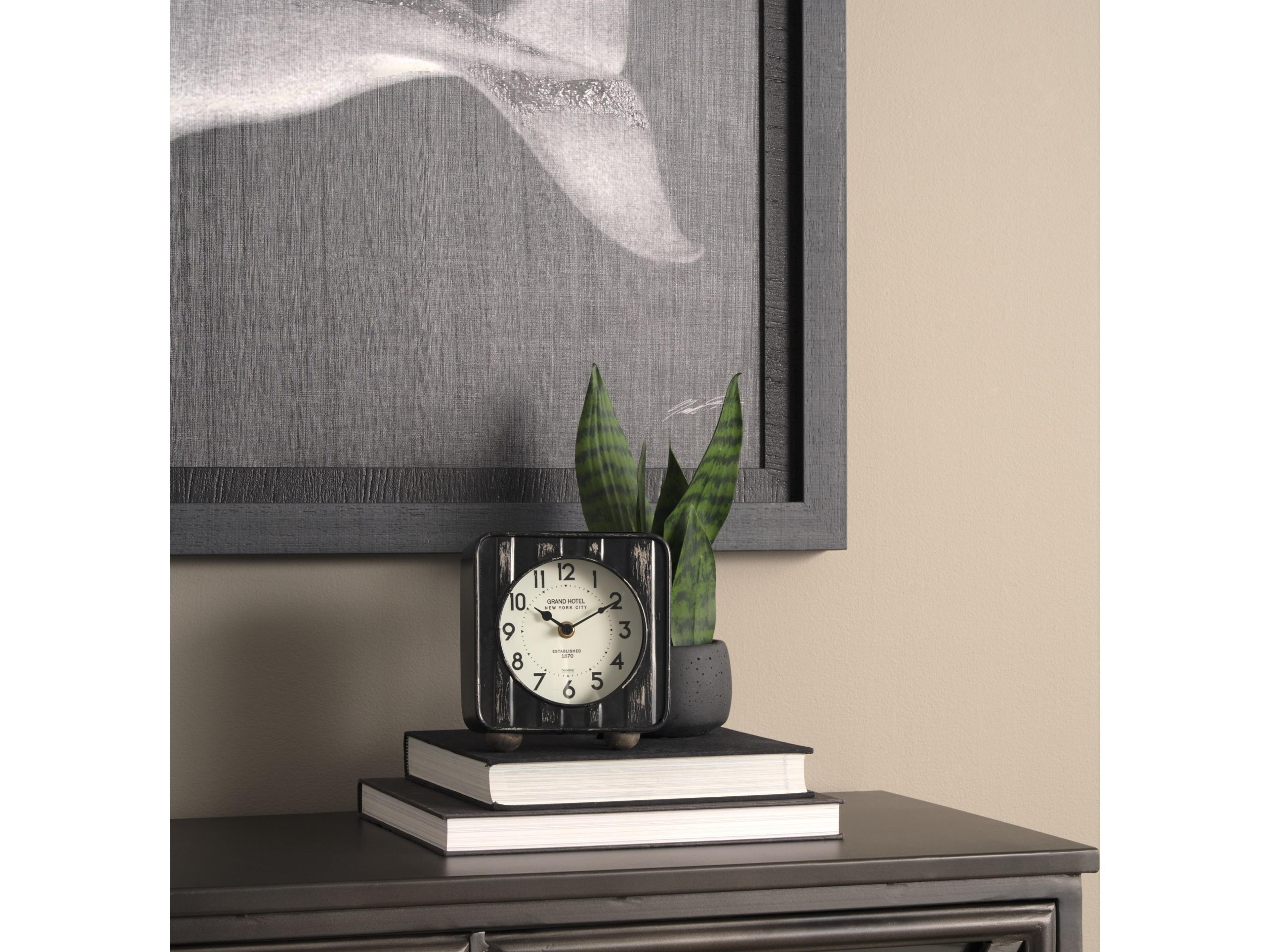 Mercana Karl 6.0L x 3.0W x 6.8H Rustic Black Iron Rounded Square Table Clock