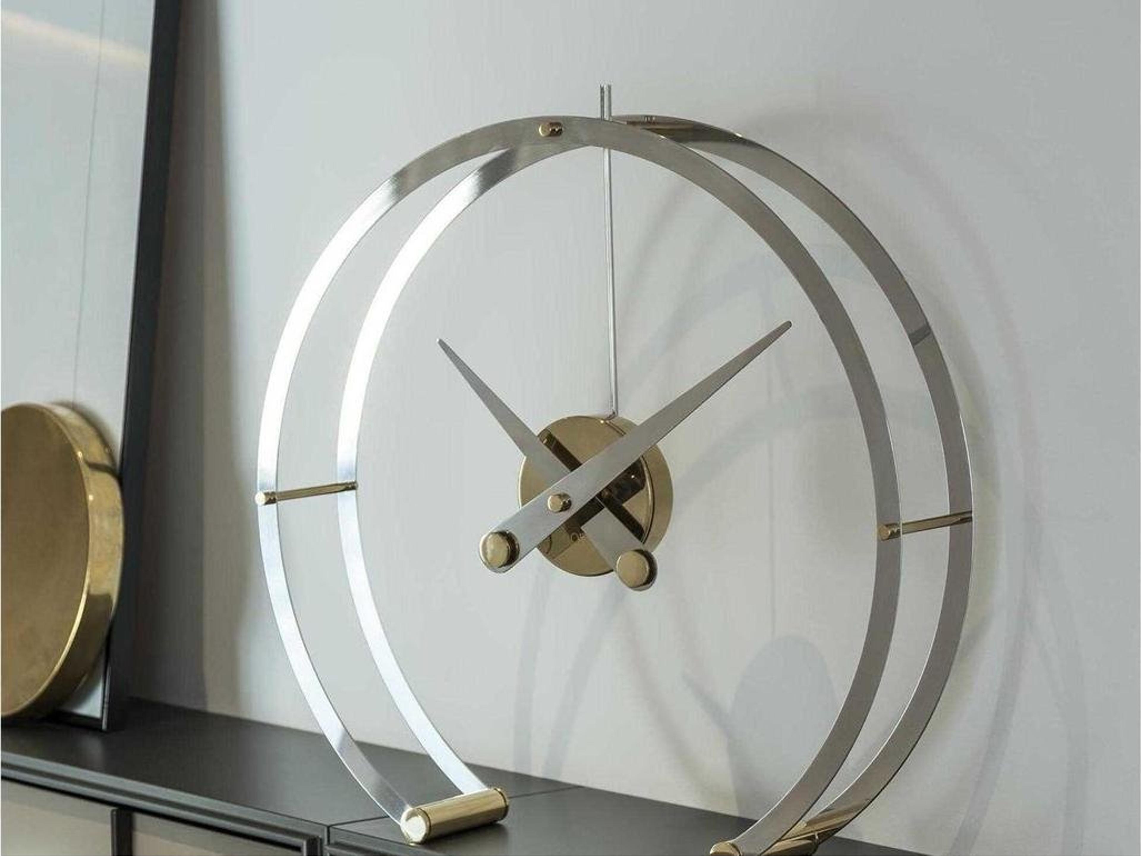 Nomon Omega Polished Brass Chrome Clock