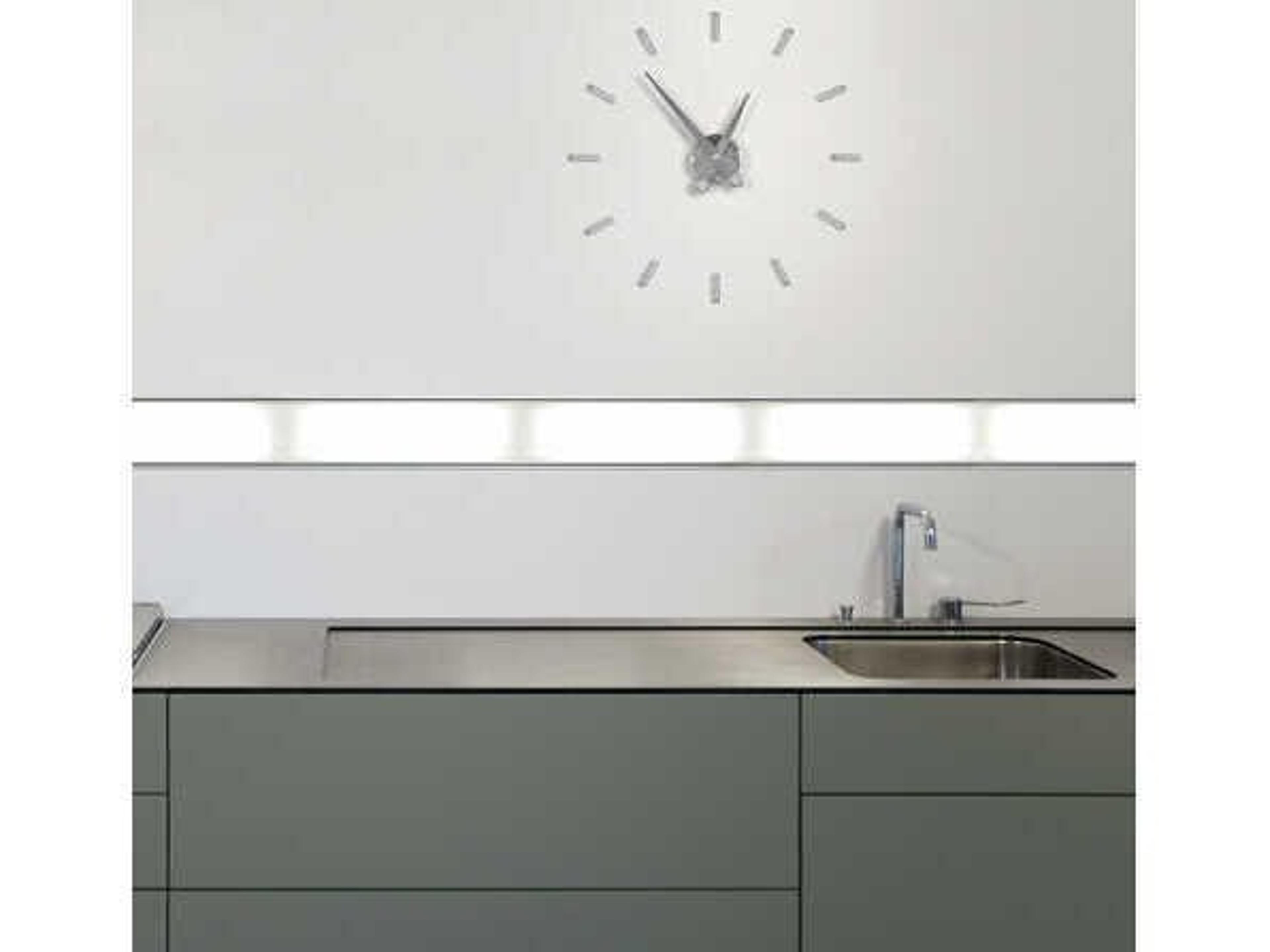 Nomon Puntos Chrome Steel Wall Clock