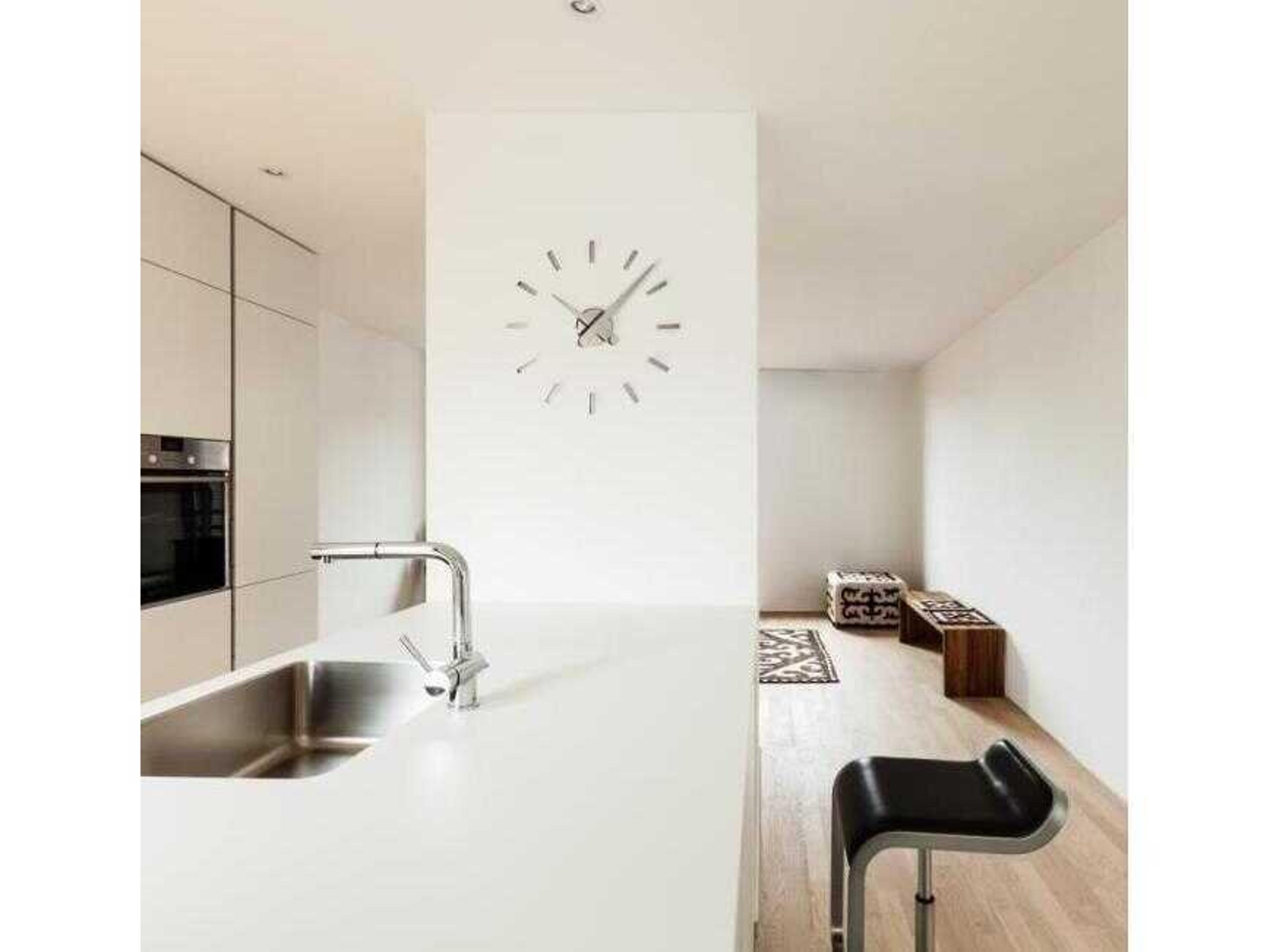 Nomon Puntos Chrome Steel Wall Clock