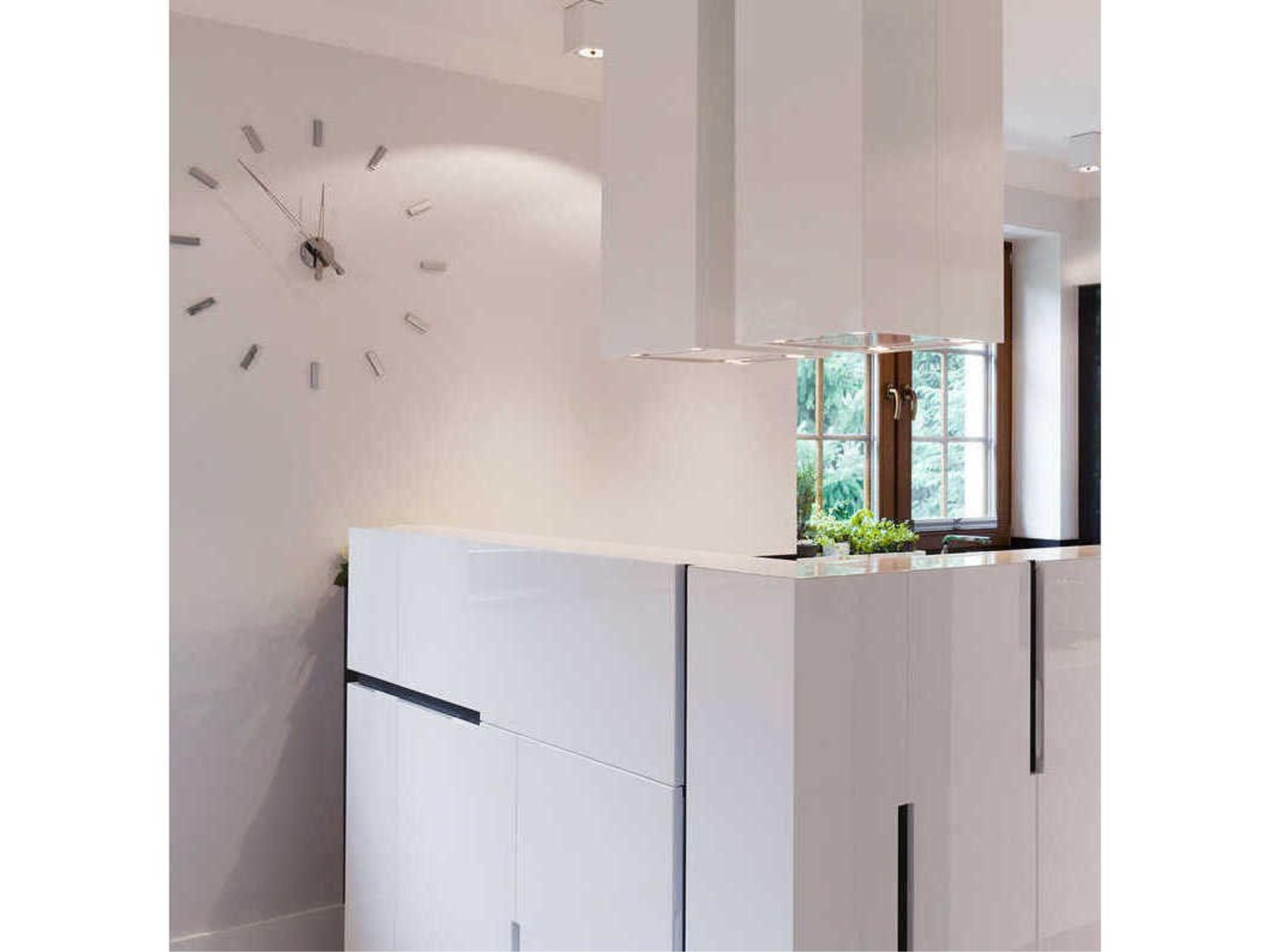 Nomon Tacon Chrome Wall Clock