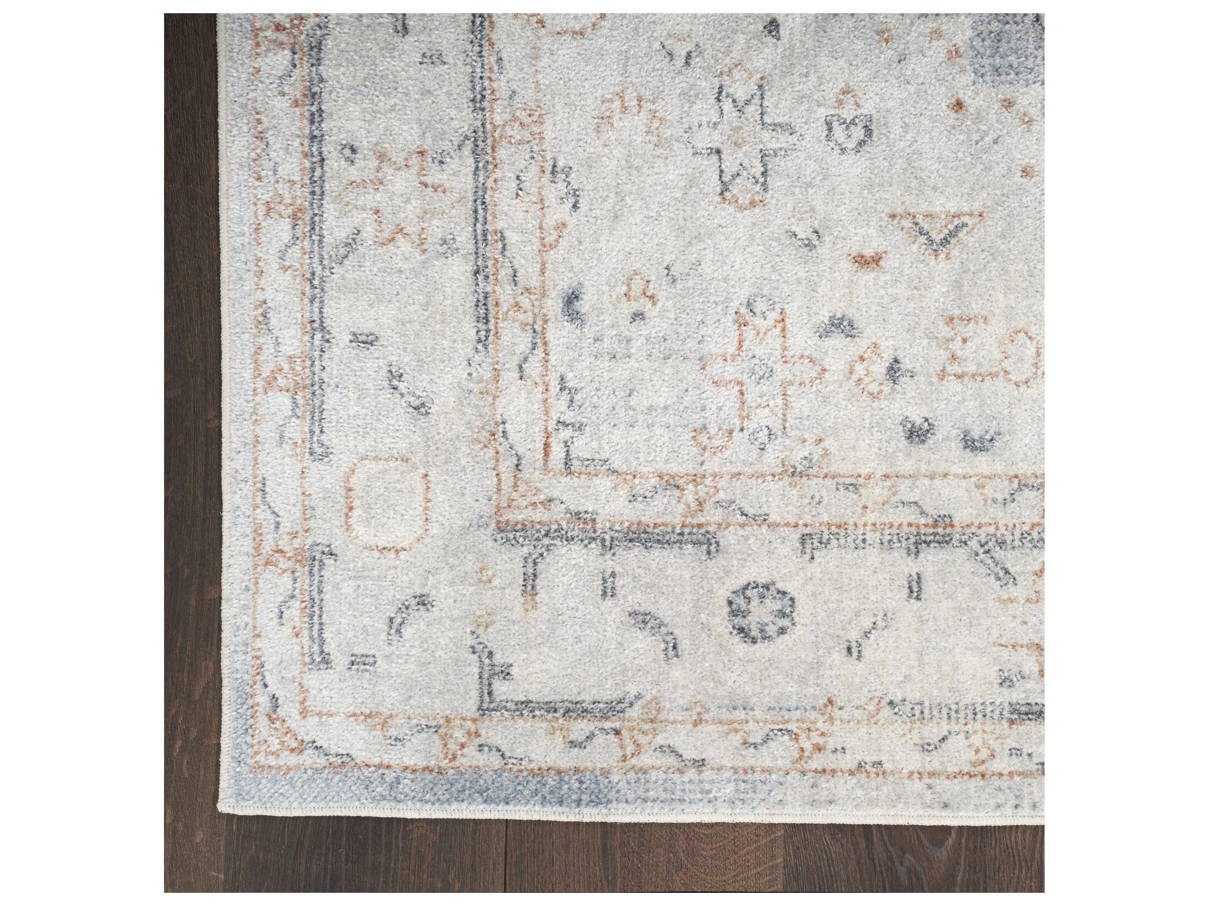 Nourison Astra Machine Washable Bordered Area Rug