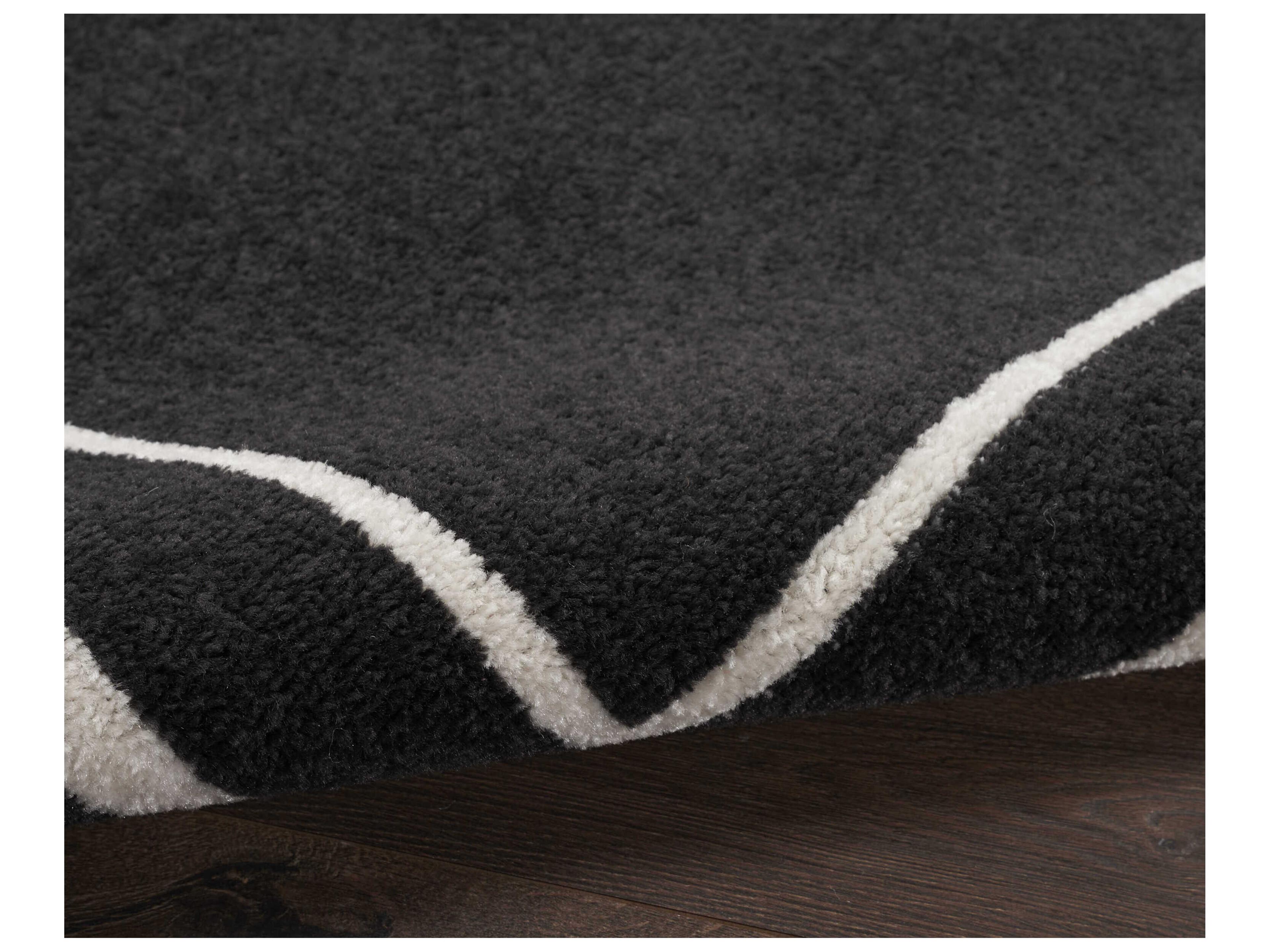 Nourison Essentials Bordered Area Rug