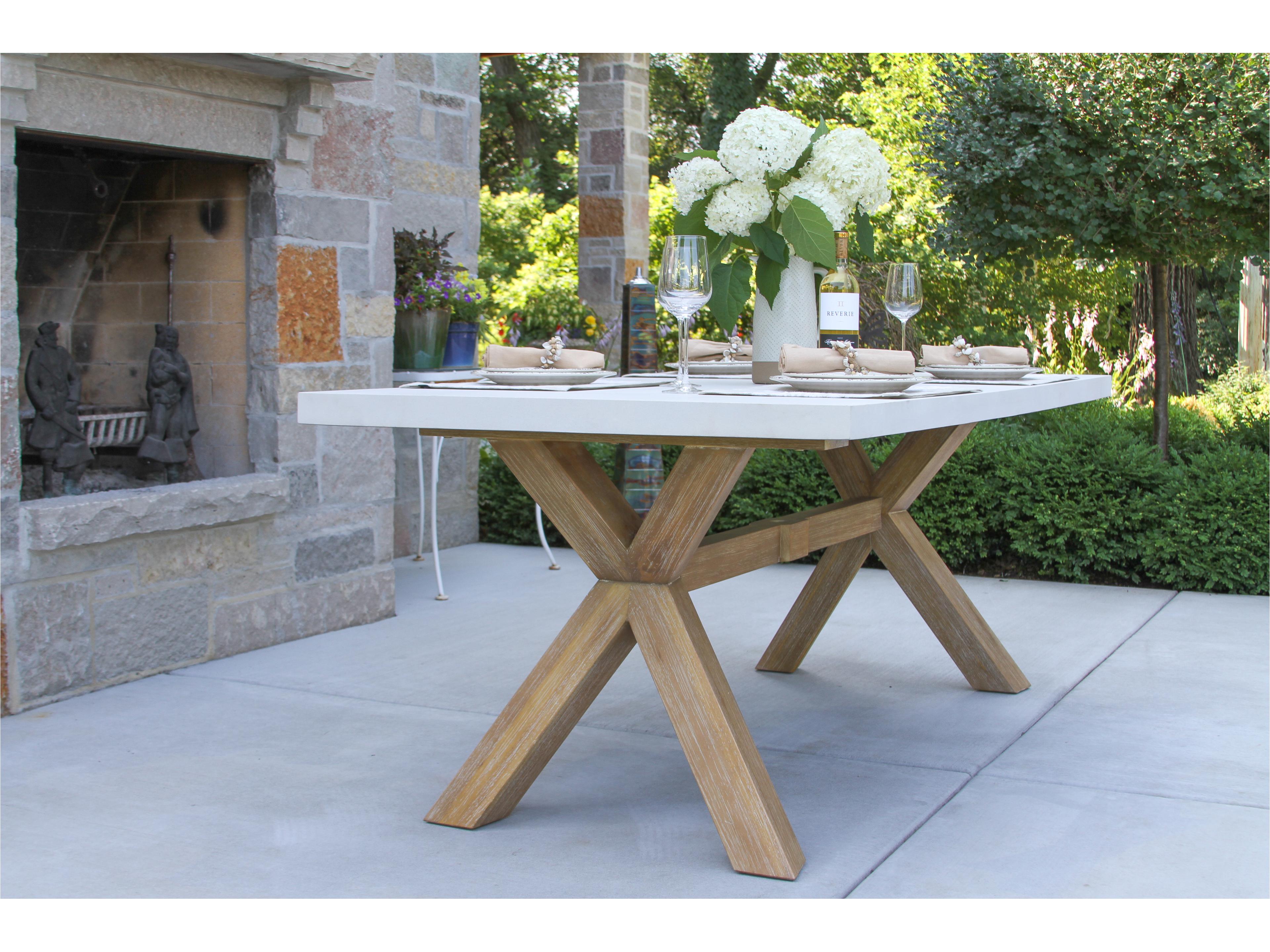 Outdoor Interiors 74" x 38" Ivory Composite & Ant. Wash Eucalyptus Dining Table