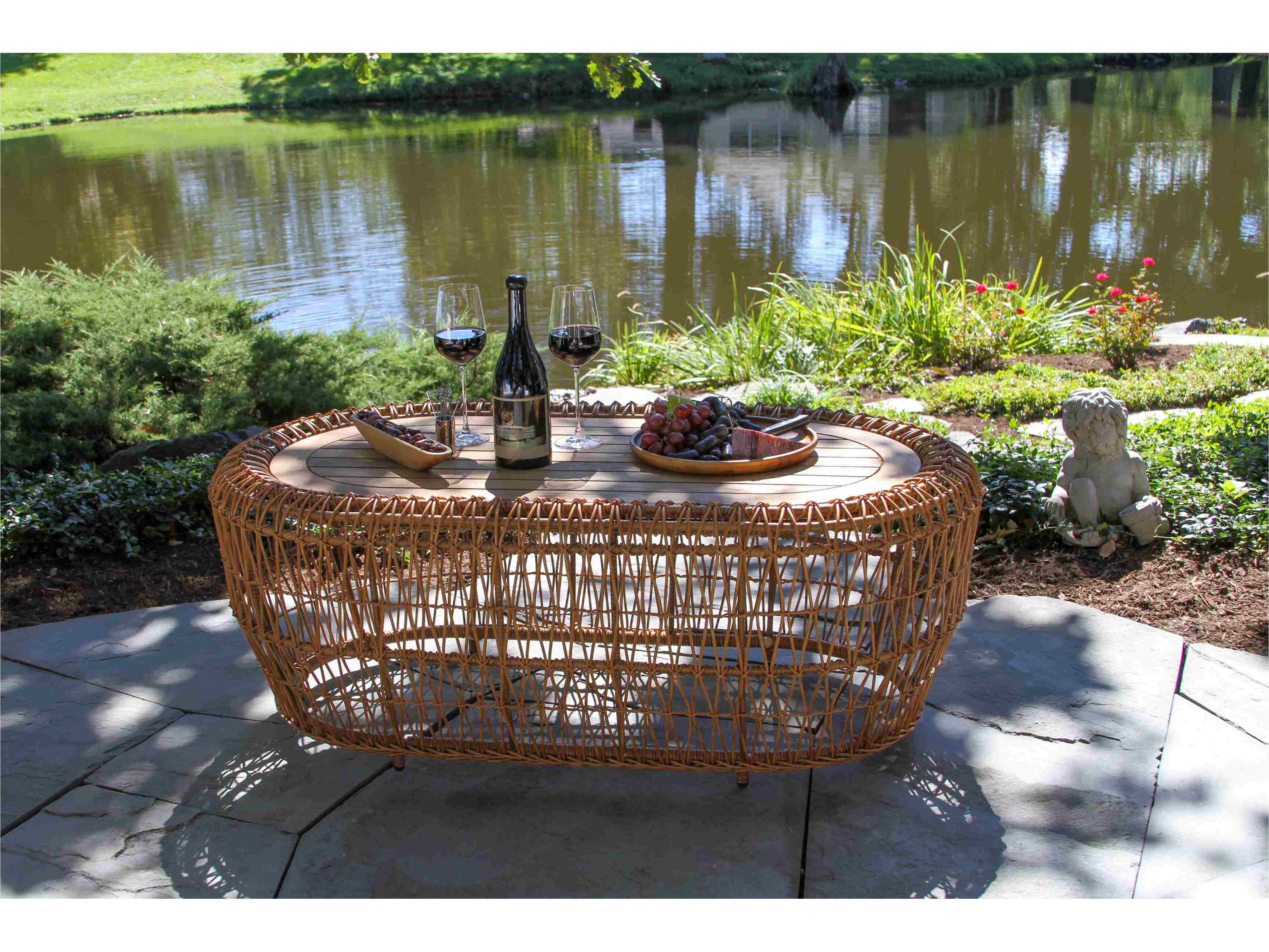 Outdoor Interiors On the Vine Teak & Wicker Oval Coffee Table, 47" x 27"