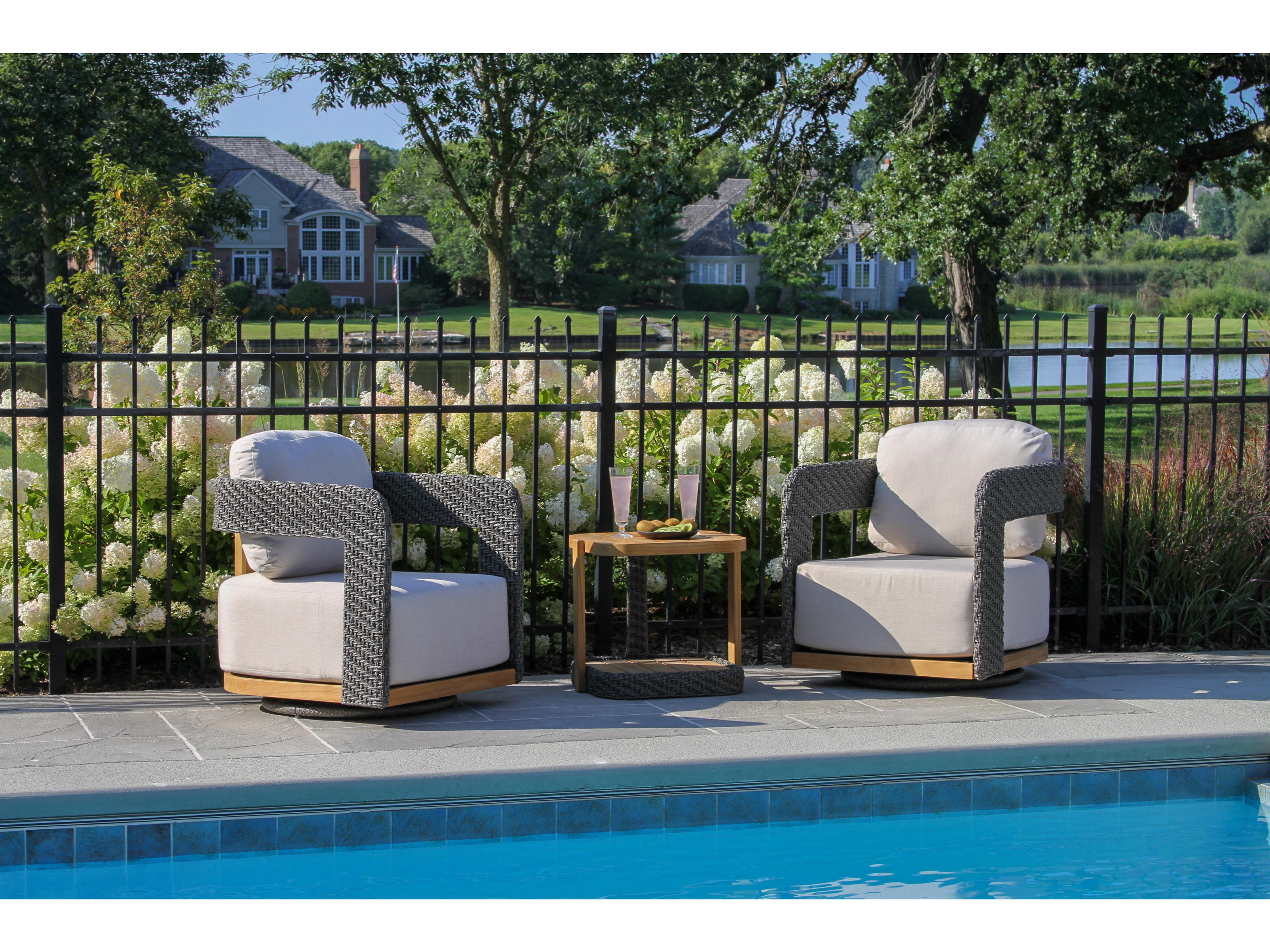 Outdoor Interiors Estate Teak & Wicker Swivel Chair w Sunbrella