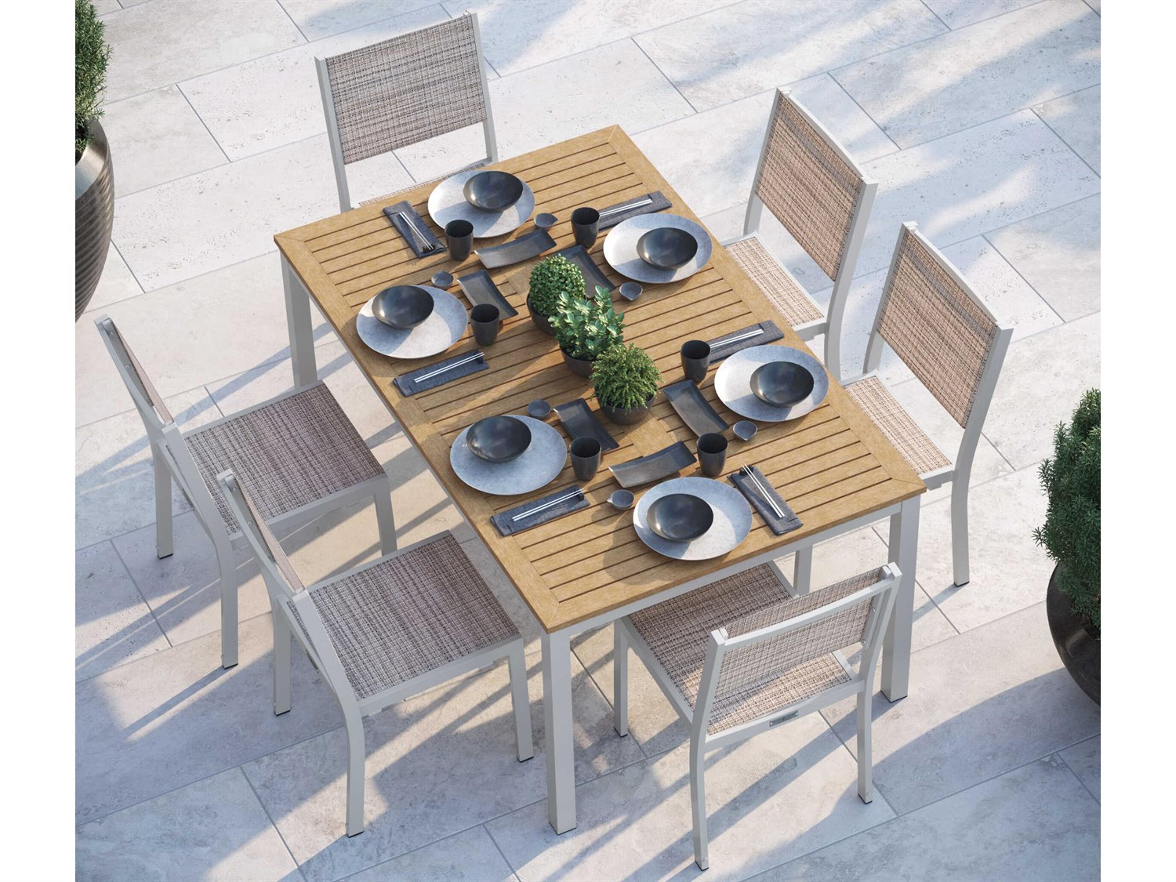Travira Aluminum Flint 63'' Rectangular Patio Dining Set with Bellows Sling