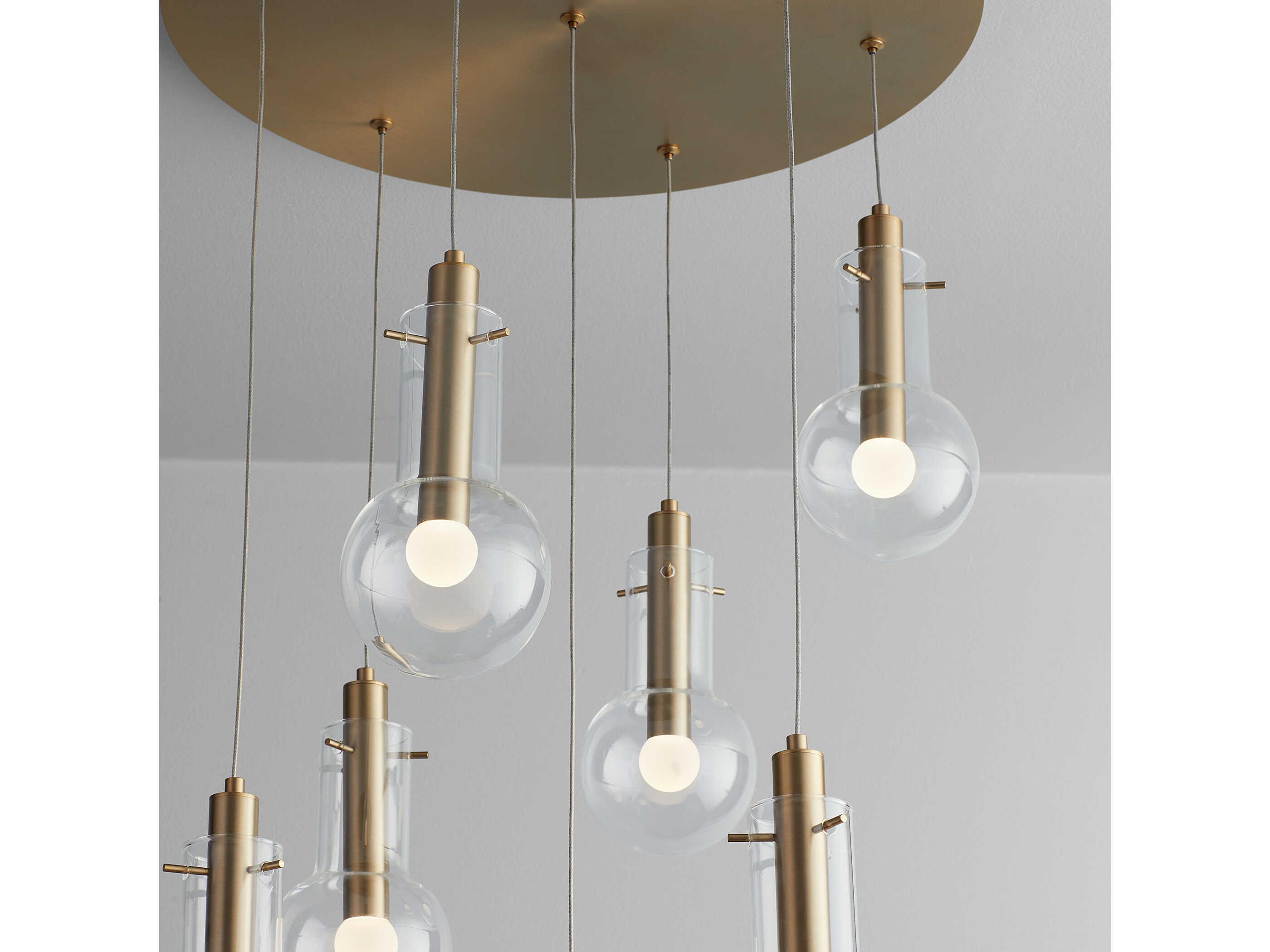 Oxygen by Quorum Primo 7-Light Aged Brass Pendant