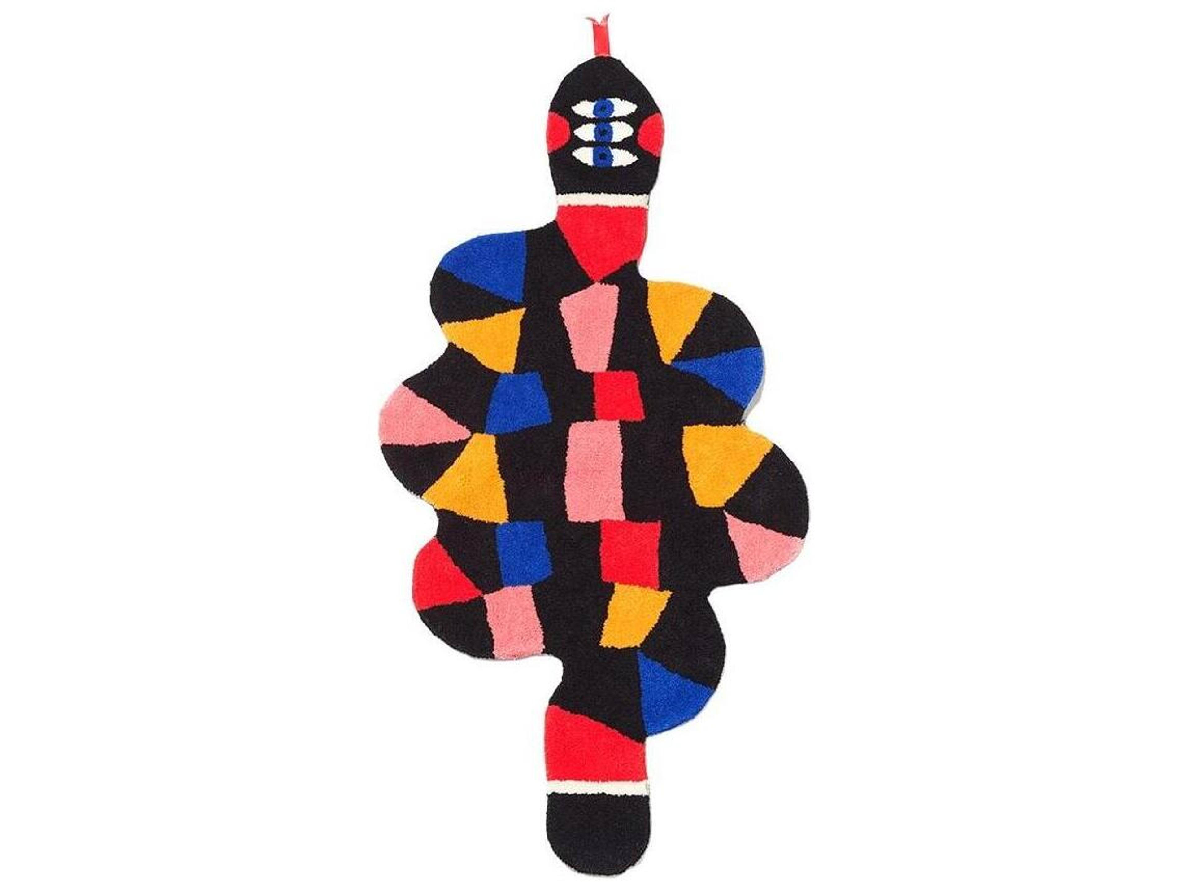 Oggian Slip M Graphic Area Rug