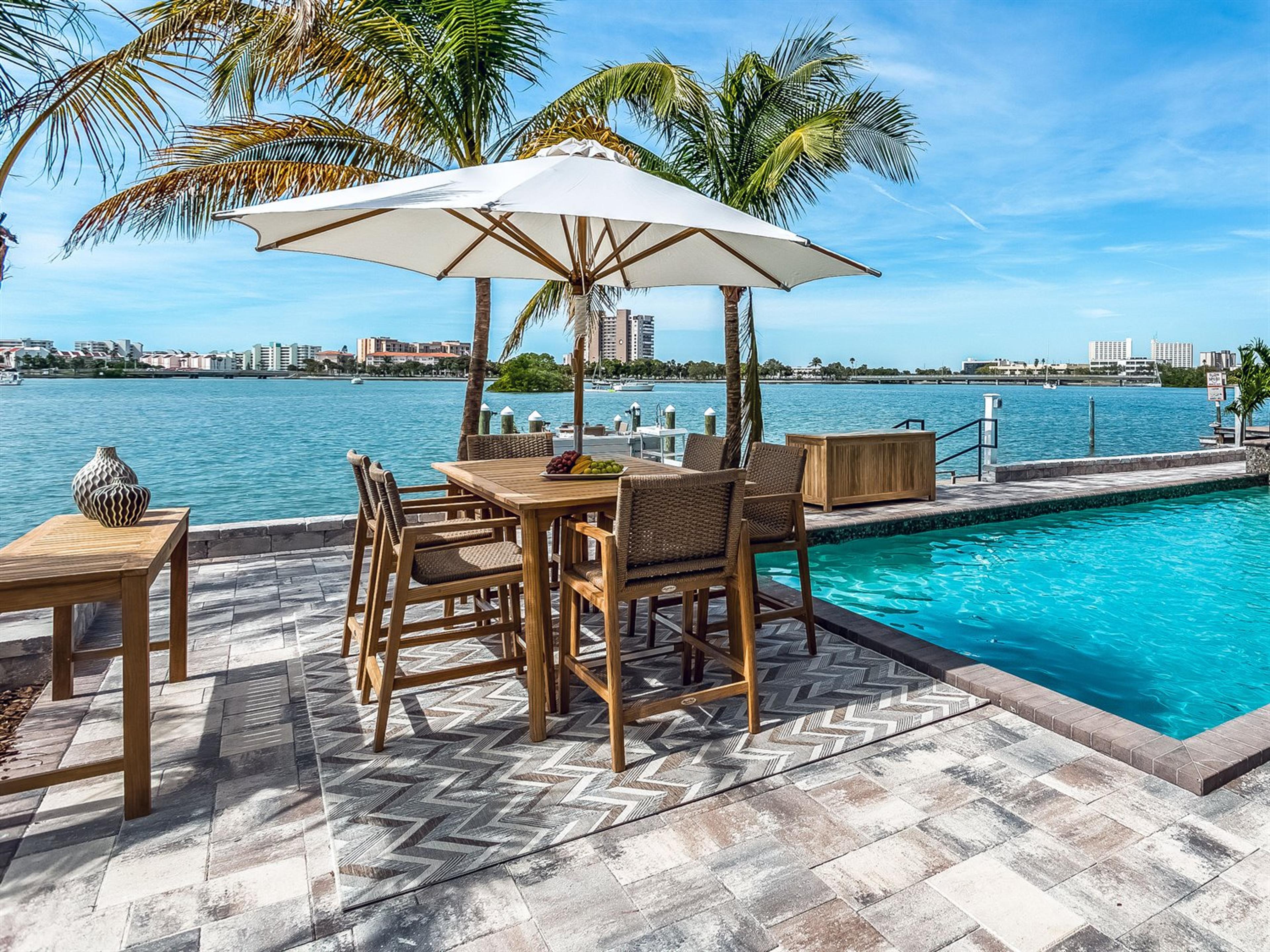 Royal Teak Collection Admiral Bar Height Arm Patio Chair