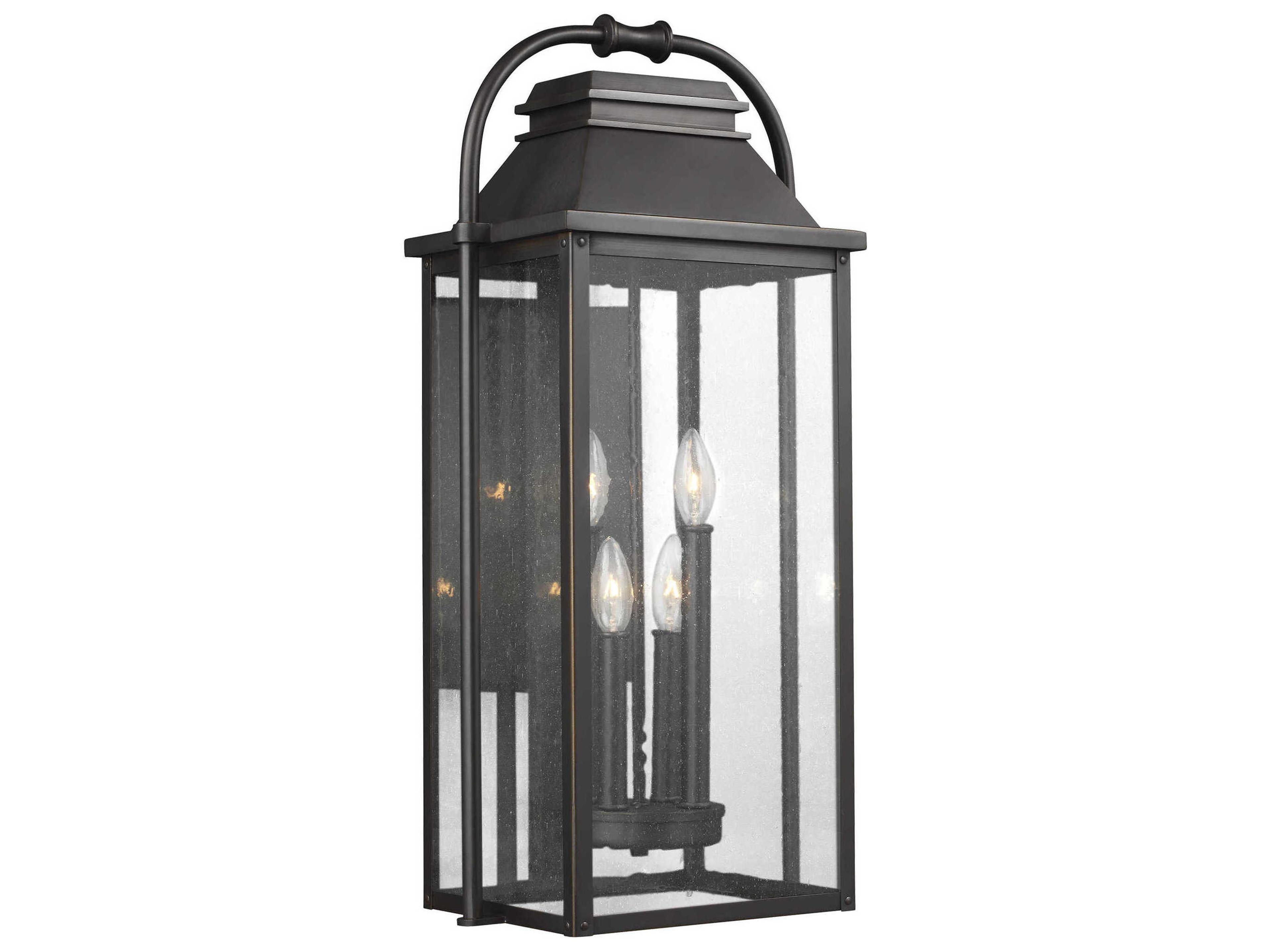 4 Light Outdoor Wall Lantern Wellsworth Antique Bronze Clear Seeded Glass
