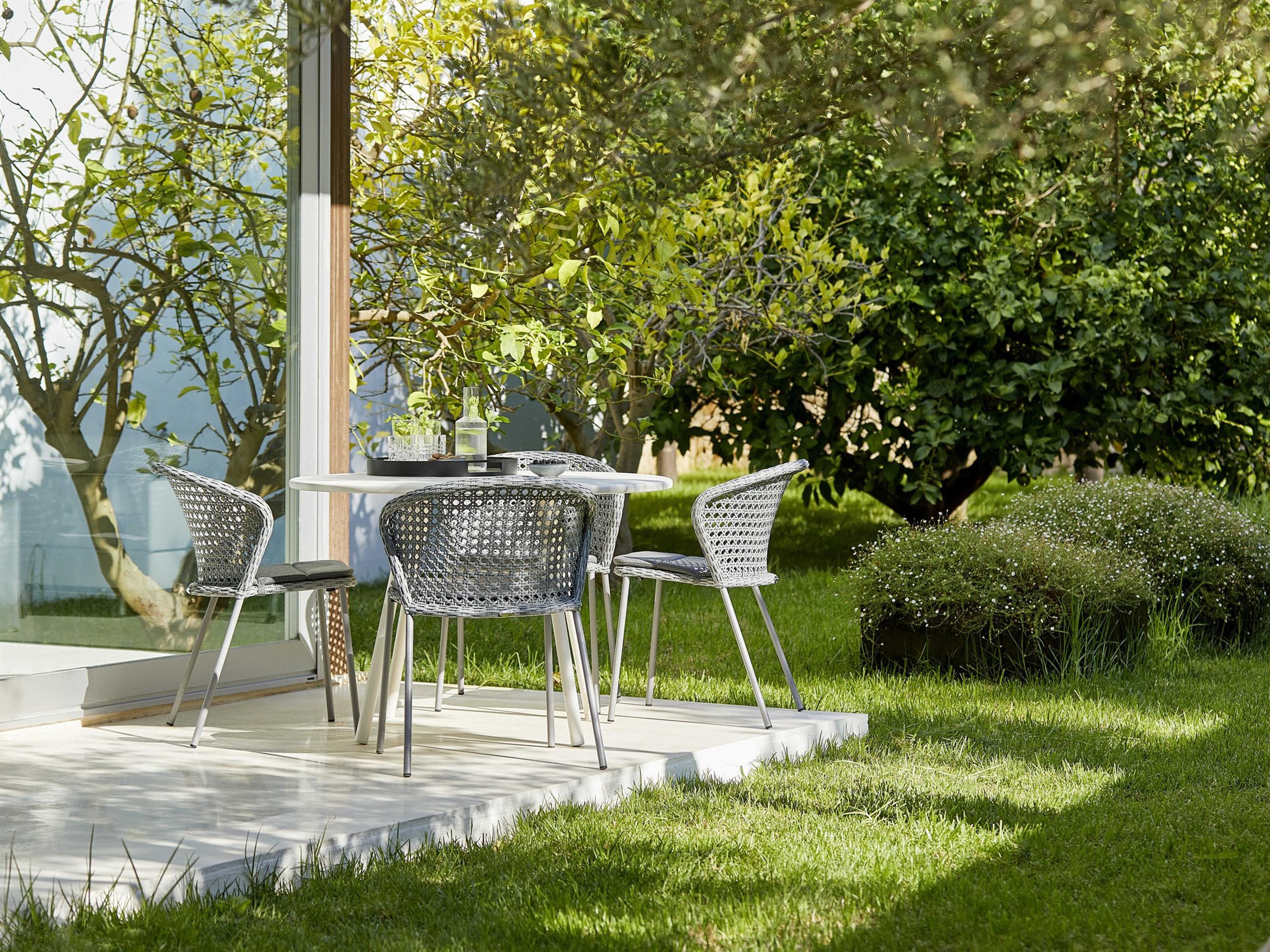 Cane Line Outdoor Lean Aluminum Wicker Dining Set