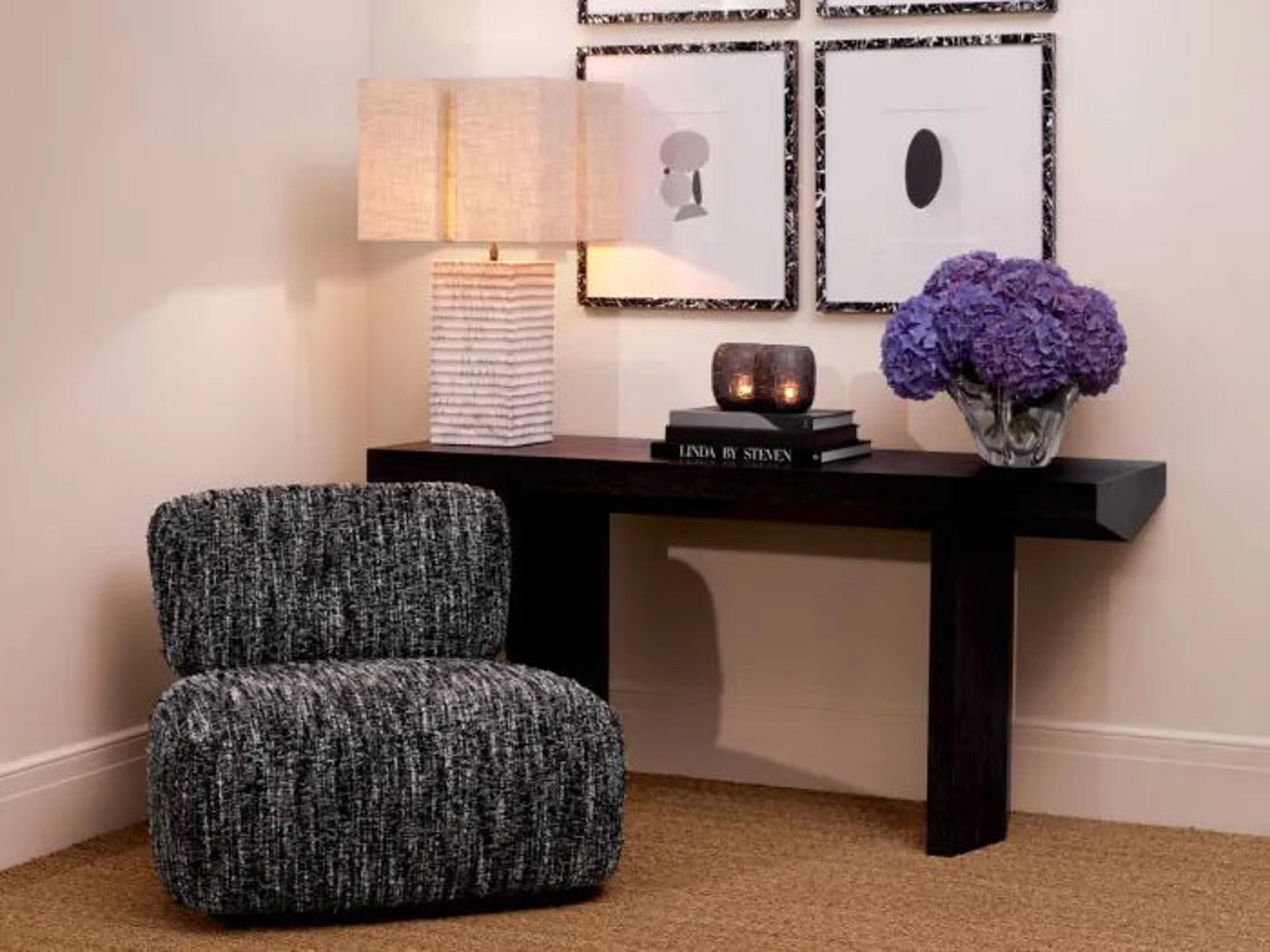 Eichholtz Leon Chair and Ottoman Set