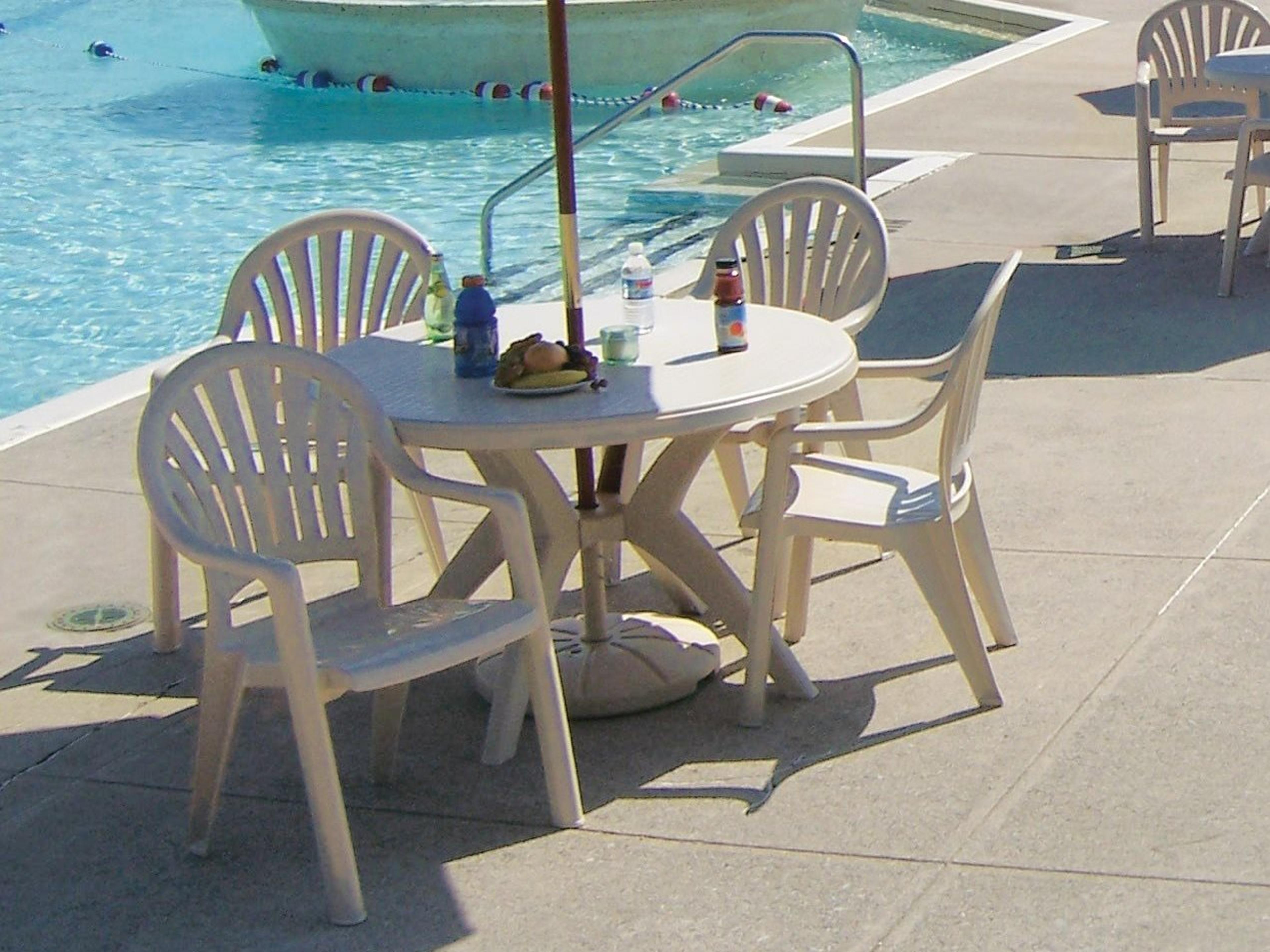 Grosfillex Pacific Fanback Resin Sand Patio Dining Set