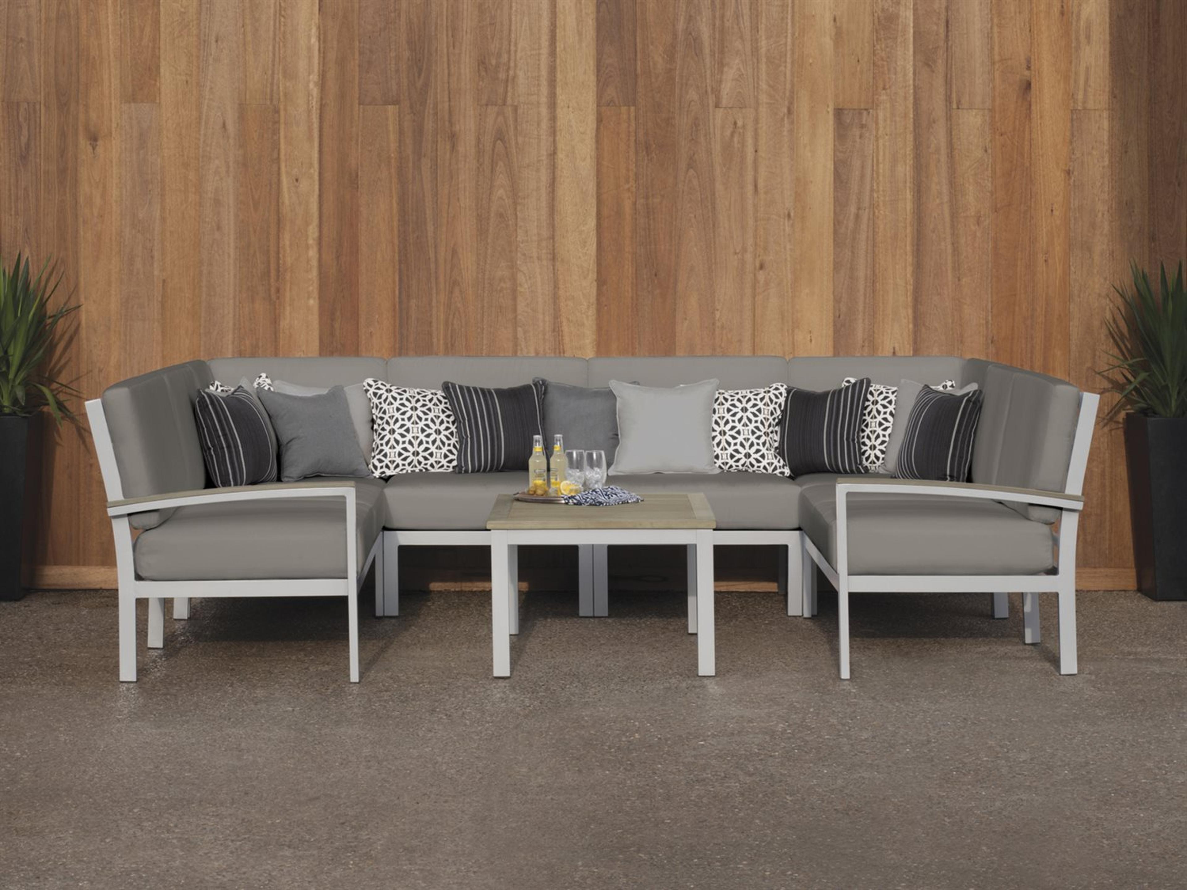 Oxford Garden Travira 7 Piece Modular Aluminum Cushion Lounge Sectional and Table Set