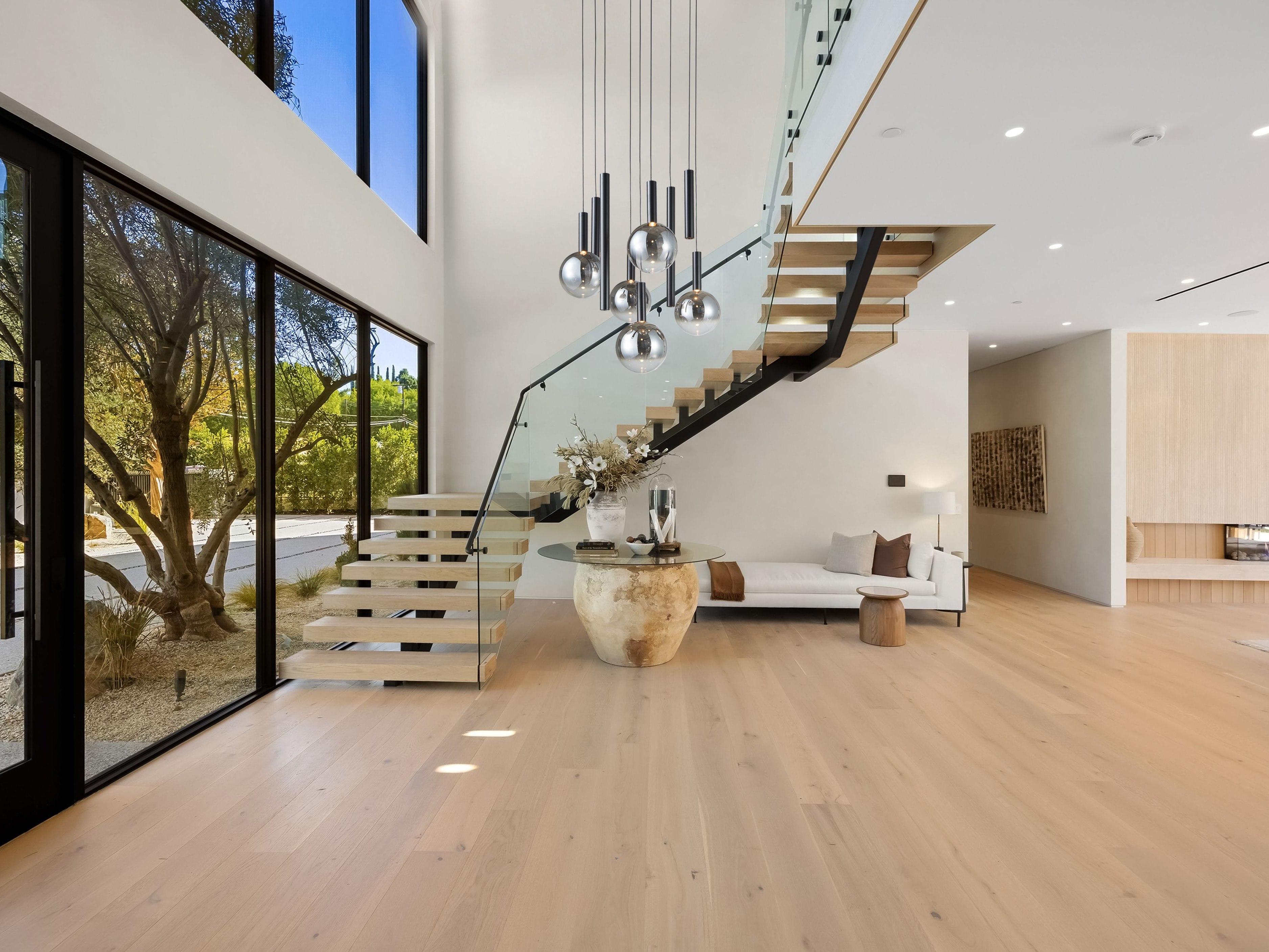 Artcraft Modella 9-Light Black Globe Round Pendant