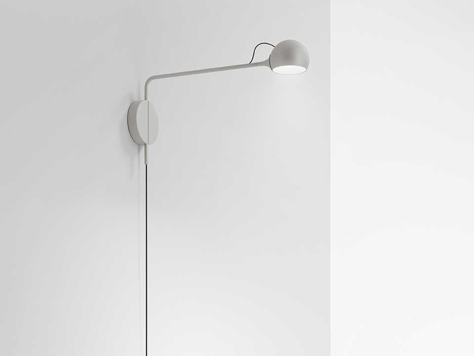 Artemide Ixa White Swing Wall Sconce
