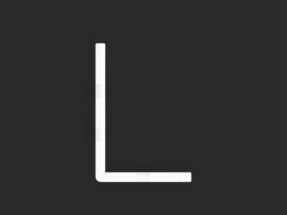 Artemide Alphabet Of Light Mini L White Wall Sconce