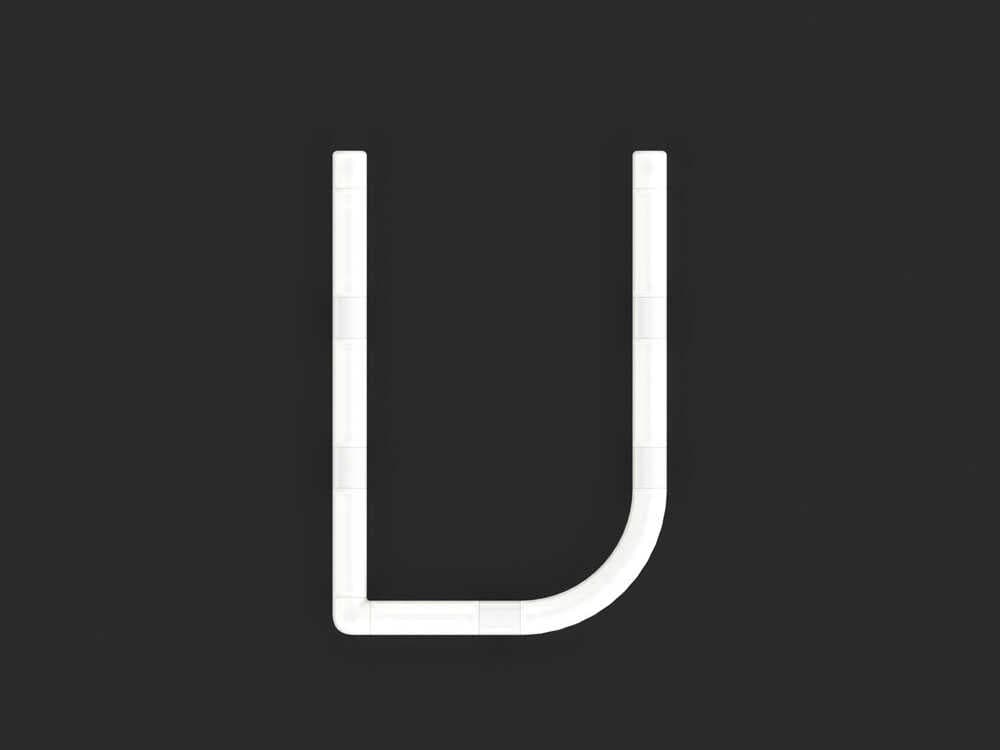 Artemide Alphabet Of Light Mini V White Wall Sconce