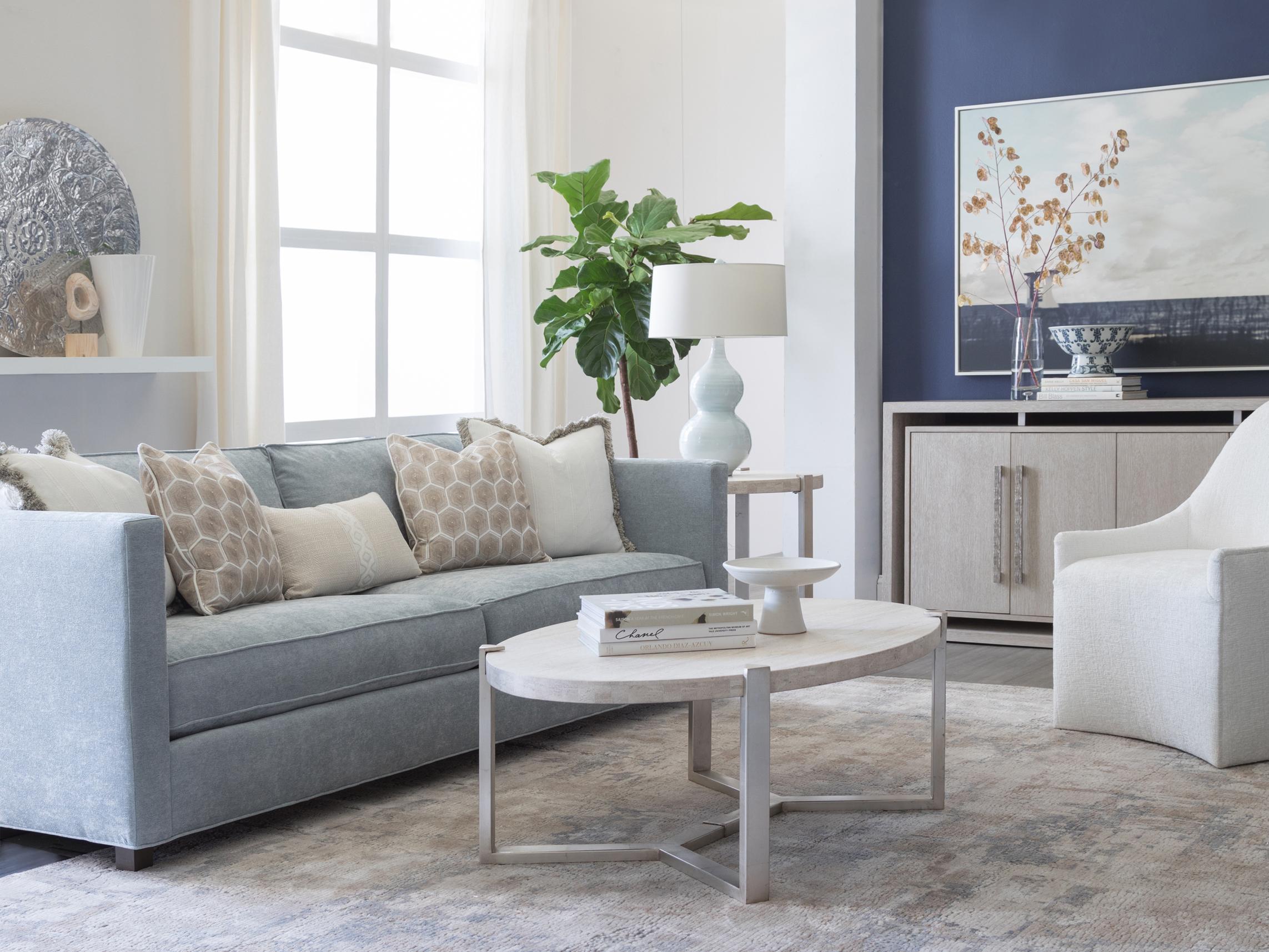 Artistica Signature Designs Denizen Oval Stone White Champagne Silver Leaf Cocktail Table