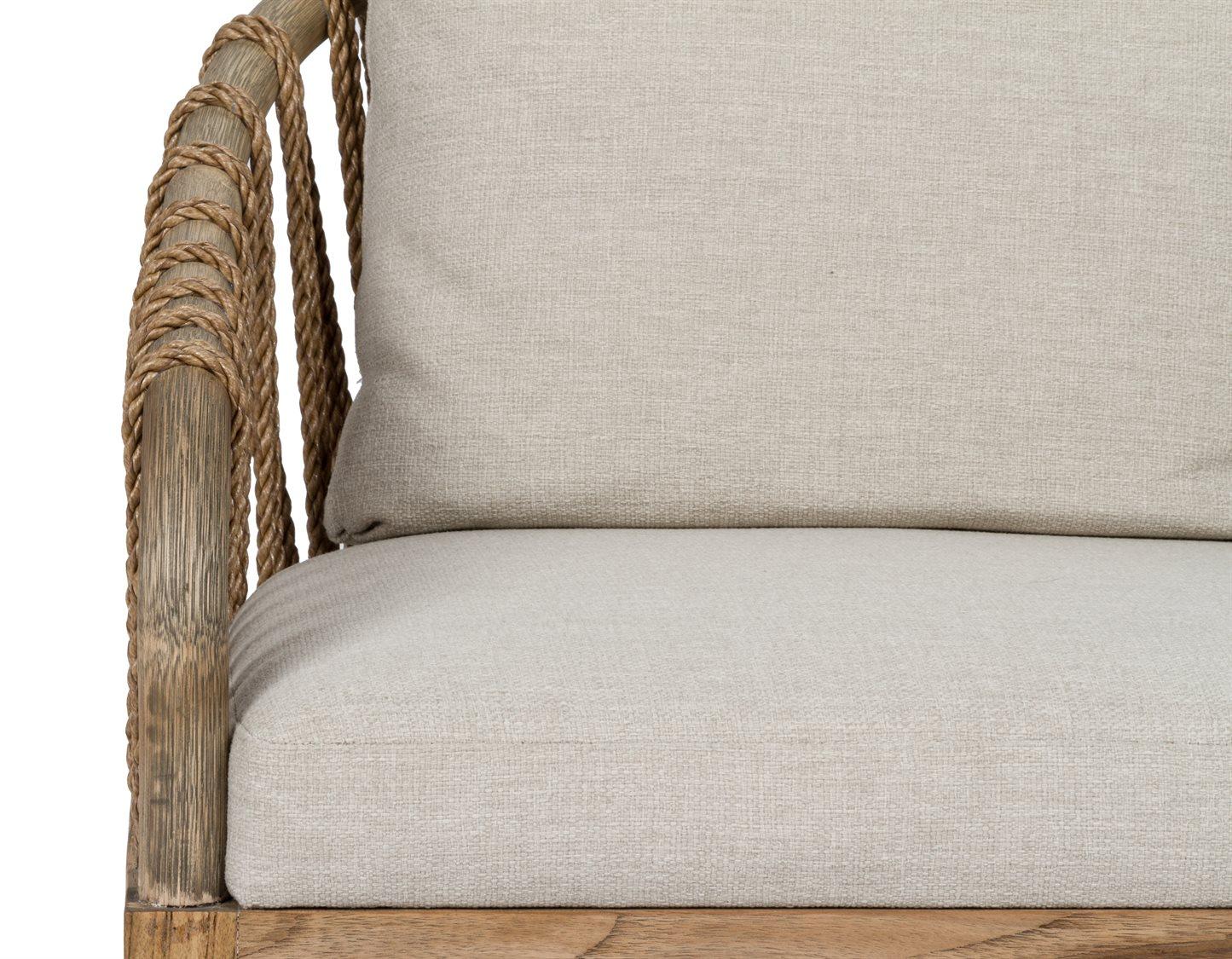 Brownstone Tulum Rattan Beige Upholstered Arm Dining Chair