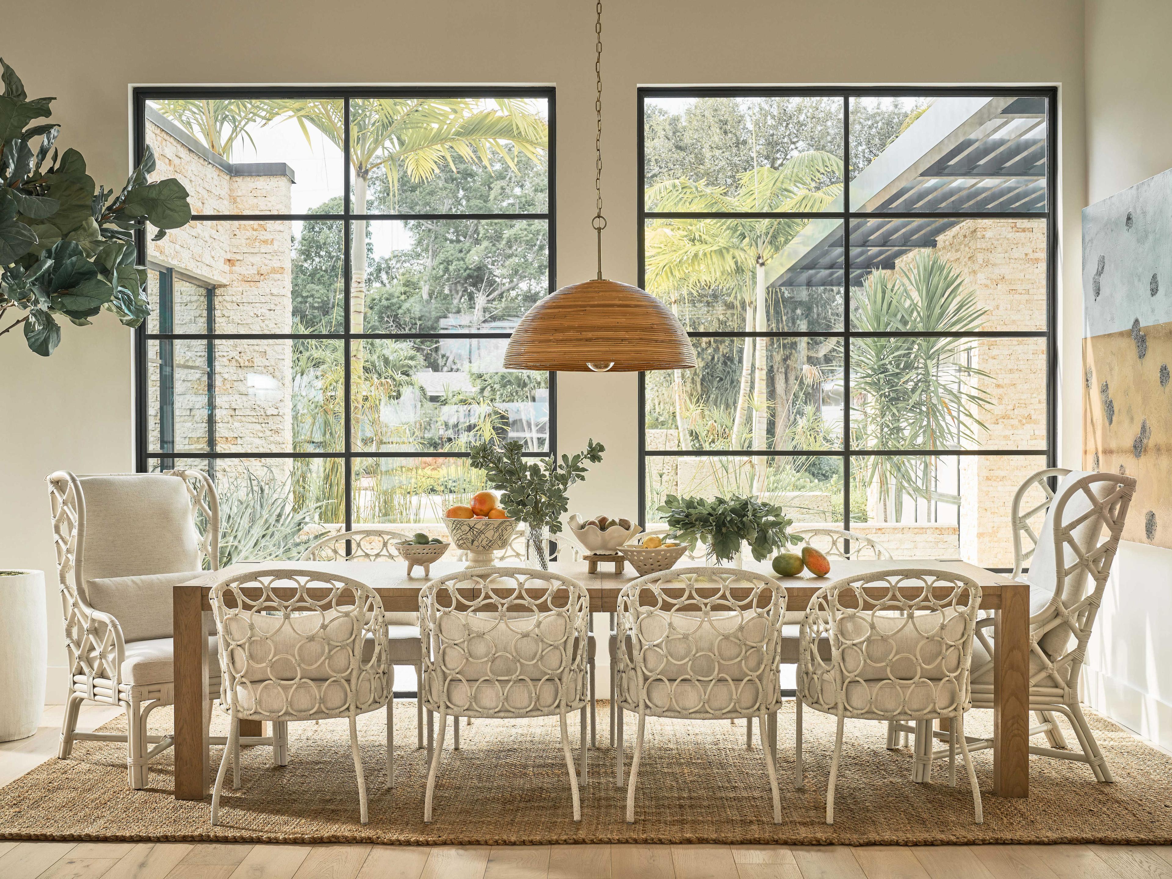 Coastal Living Home Weekender Rattan White Upholstered Arm Dining Chair