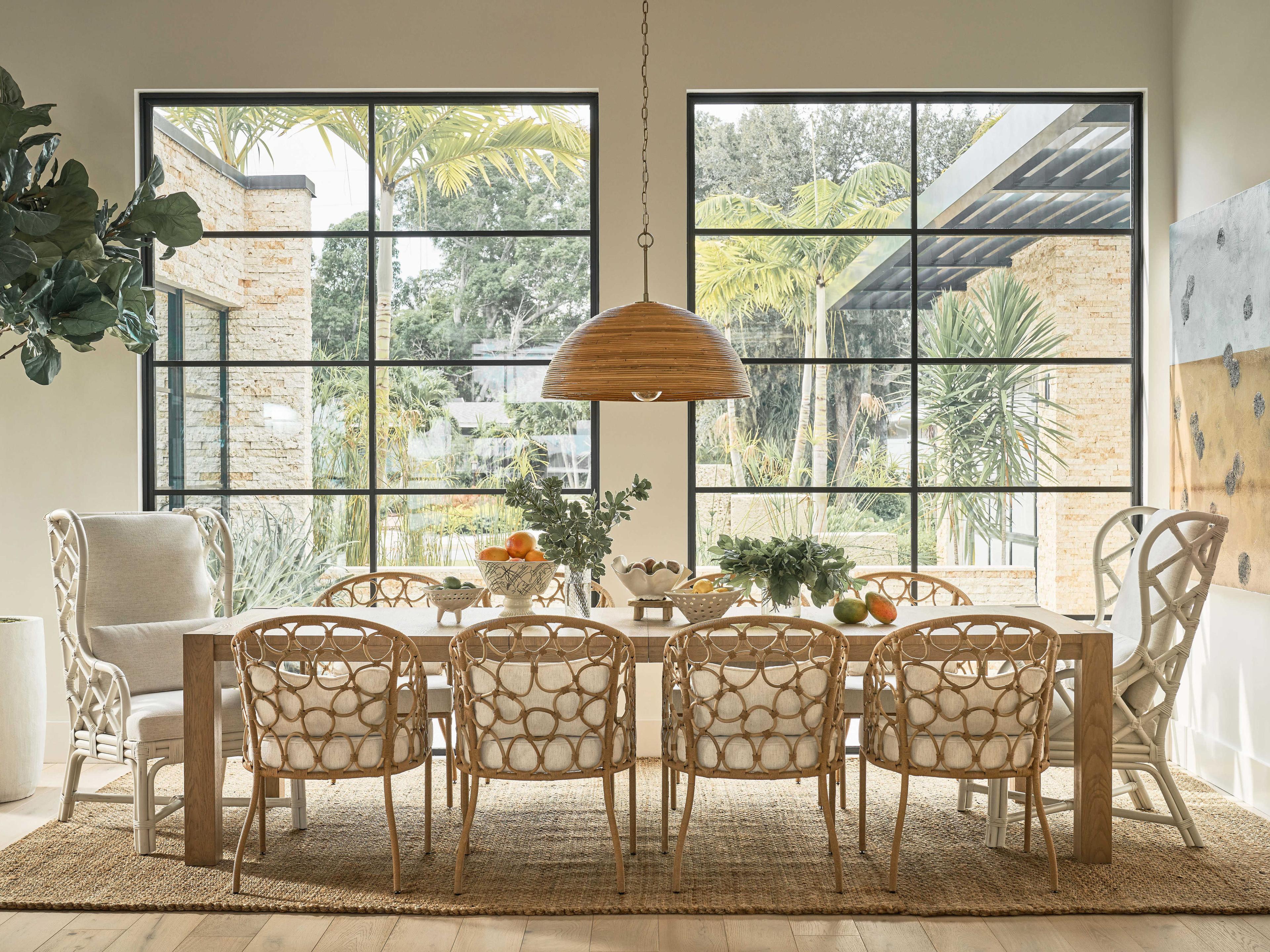 Coastal Living Home Weekender Rattan White Upholstered Arm Dining Chair