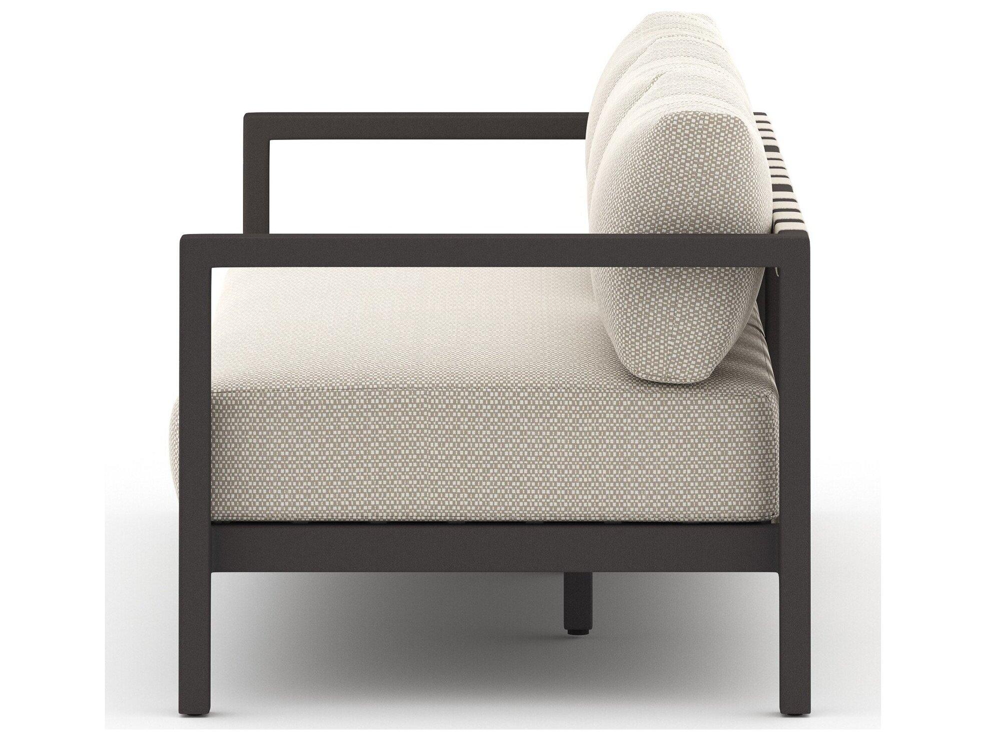 Four Hands Outdoor Solano Bronze / Ivory Strap Sofa with Faye Sand Cushion