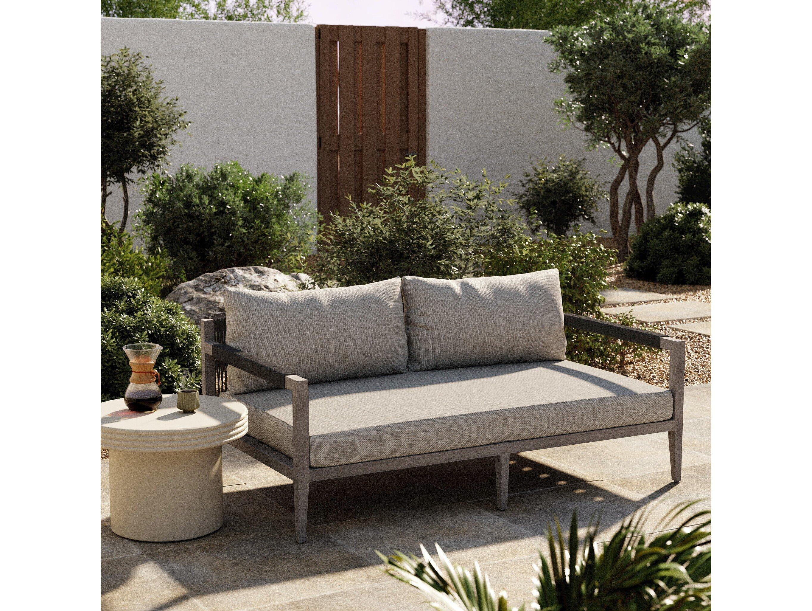 Four Hands Outdoor Solano Sherwood Weathered Grey Teak Cushion 63" Sofa in Stone Grey