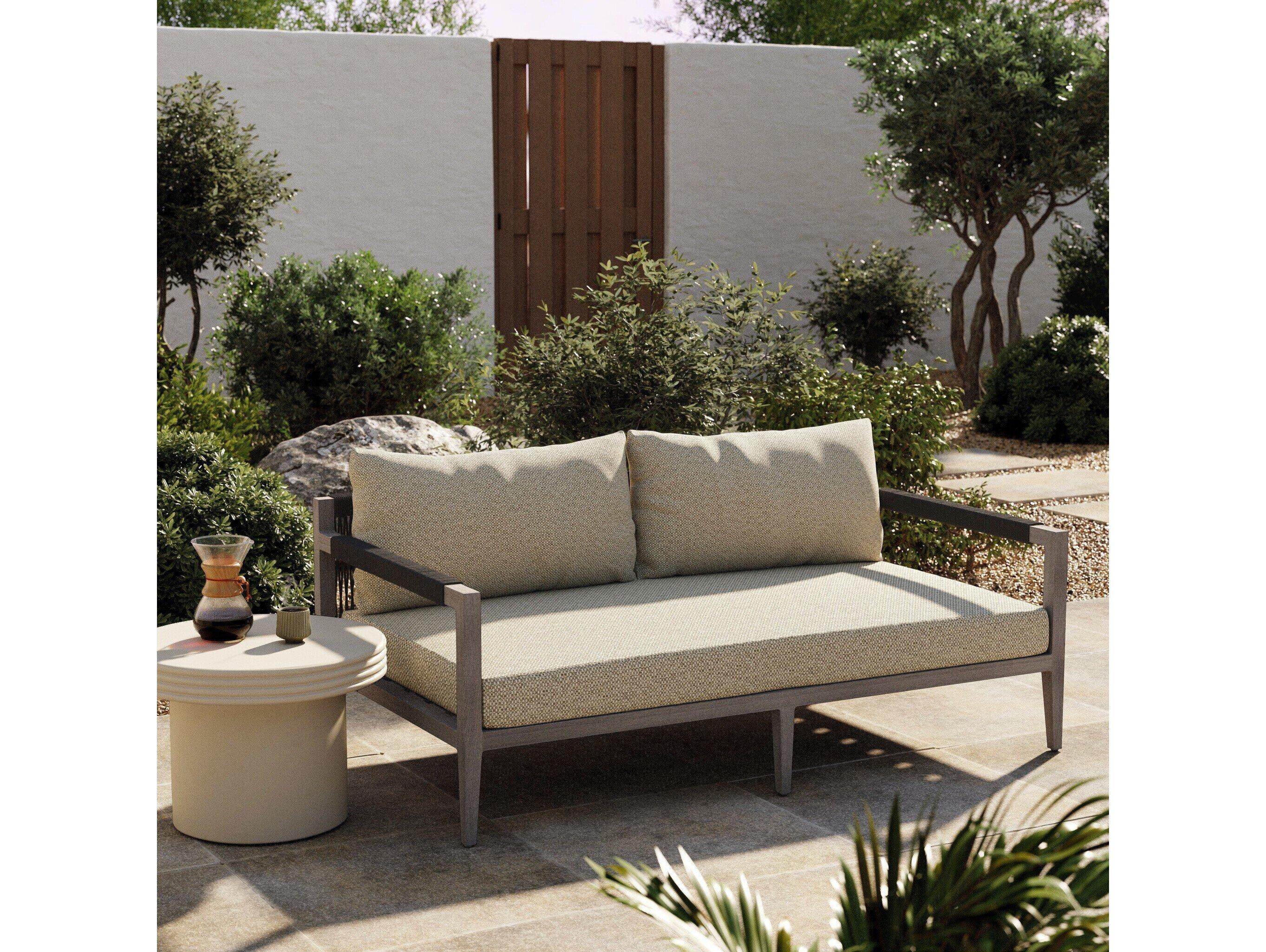 Four Hands Outdoor Solano Sherwood Weathered Grey Teak Cushion 63" Sofa in Faye Sand