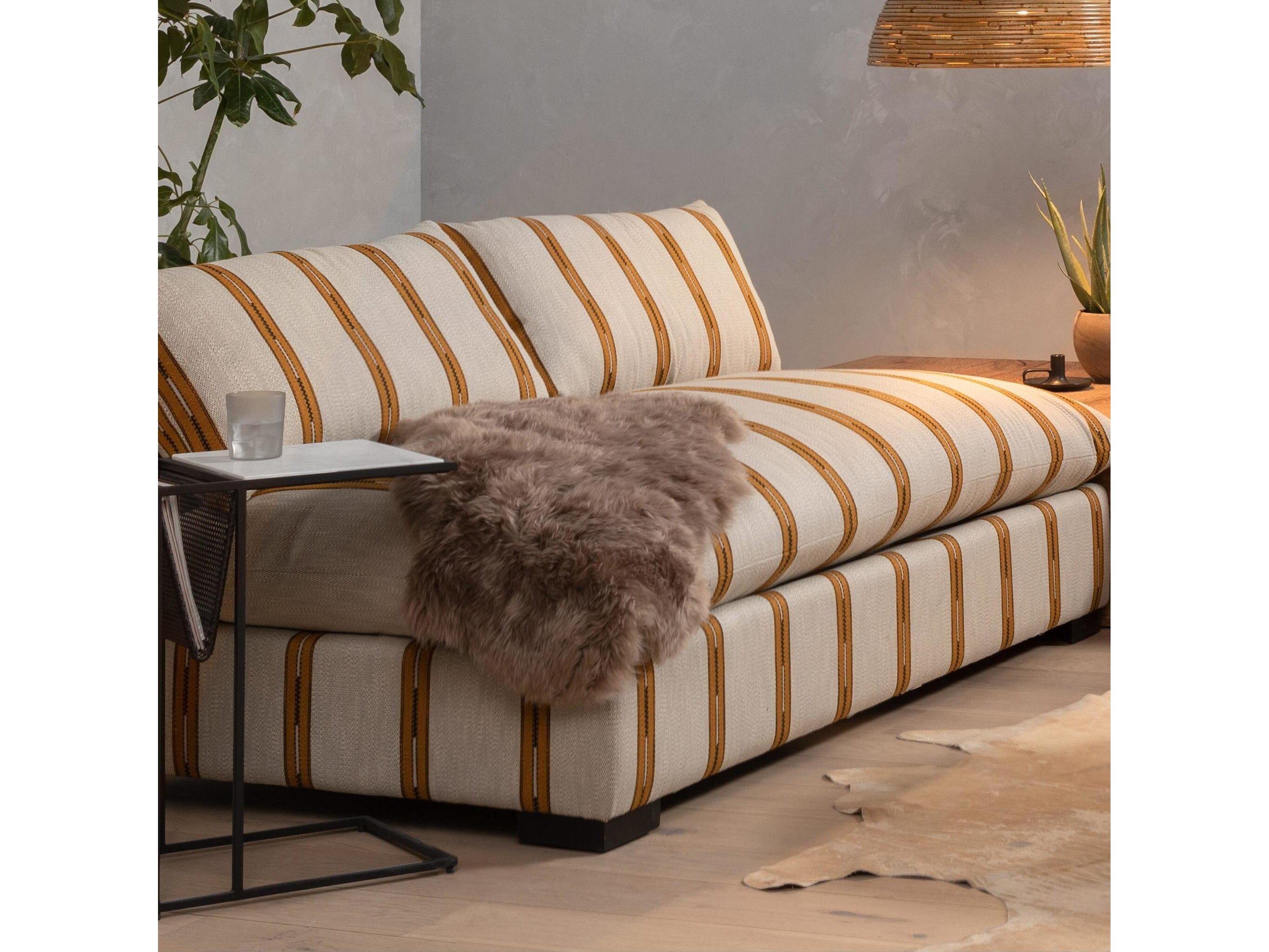 Four Hands Mateo Lalo Lambskin Throw Taupe